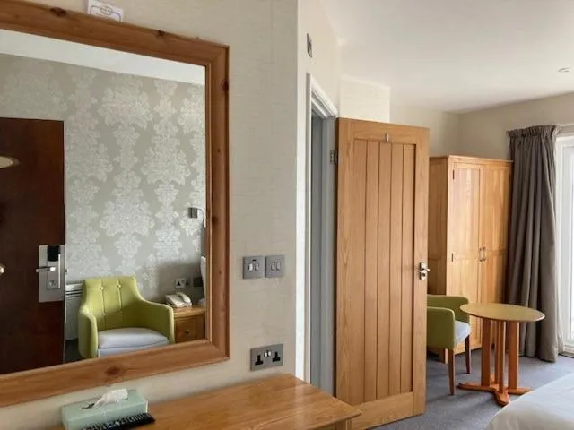 Bed in The Cottage Hotel