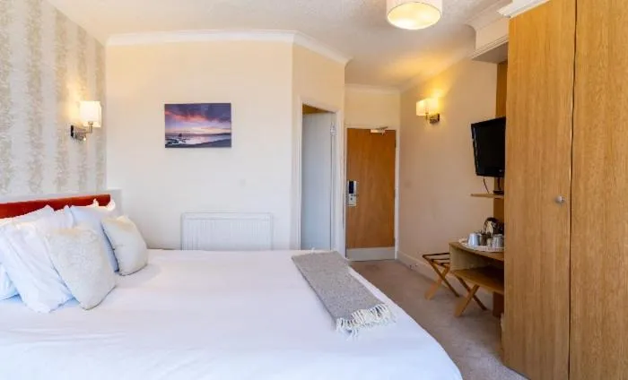 Bed in The Cottage Hotel