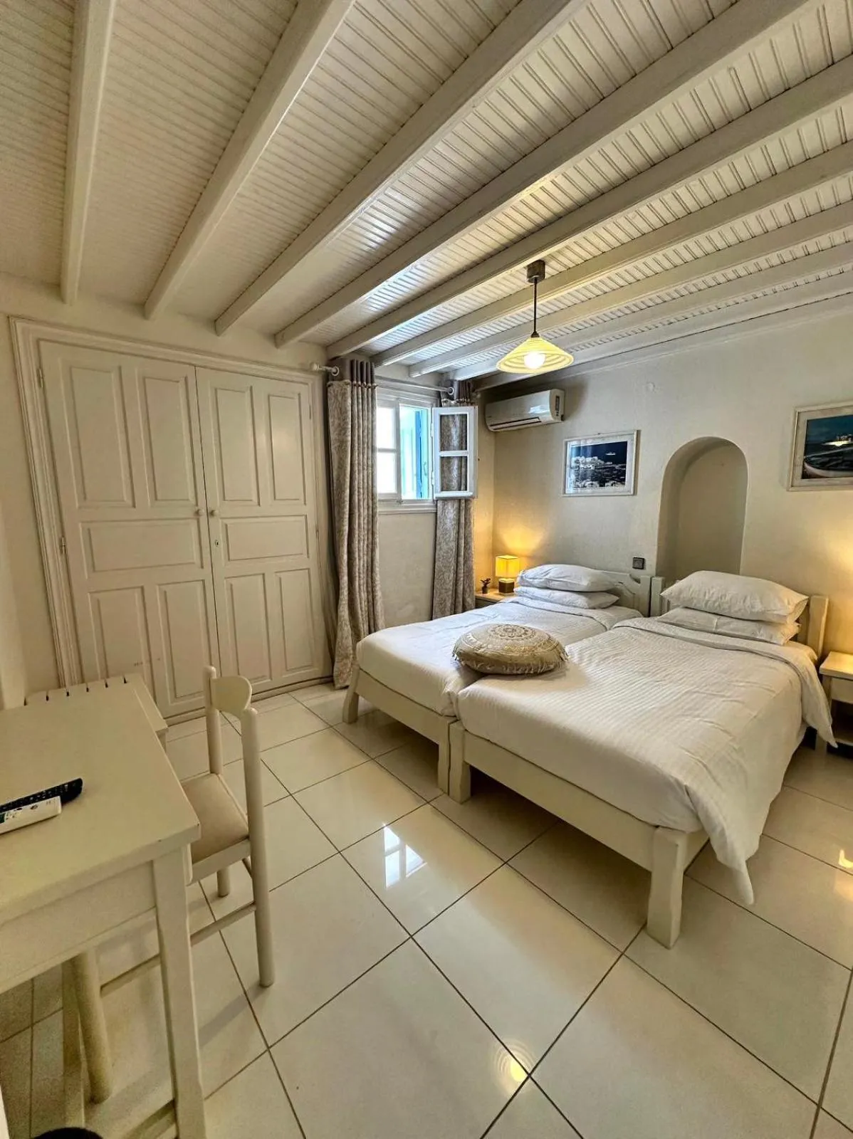 Bed in Le Coq Apartments