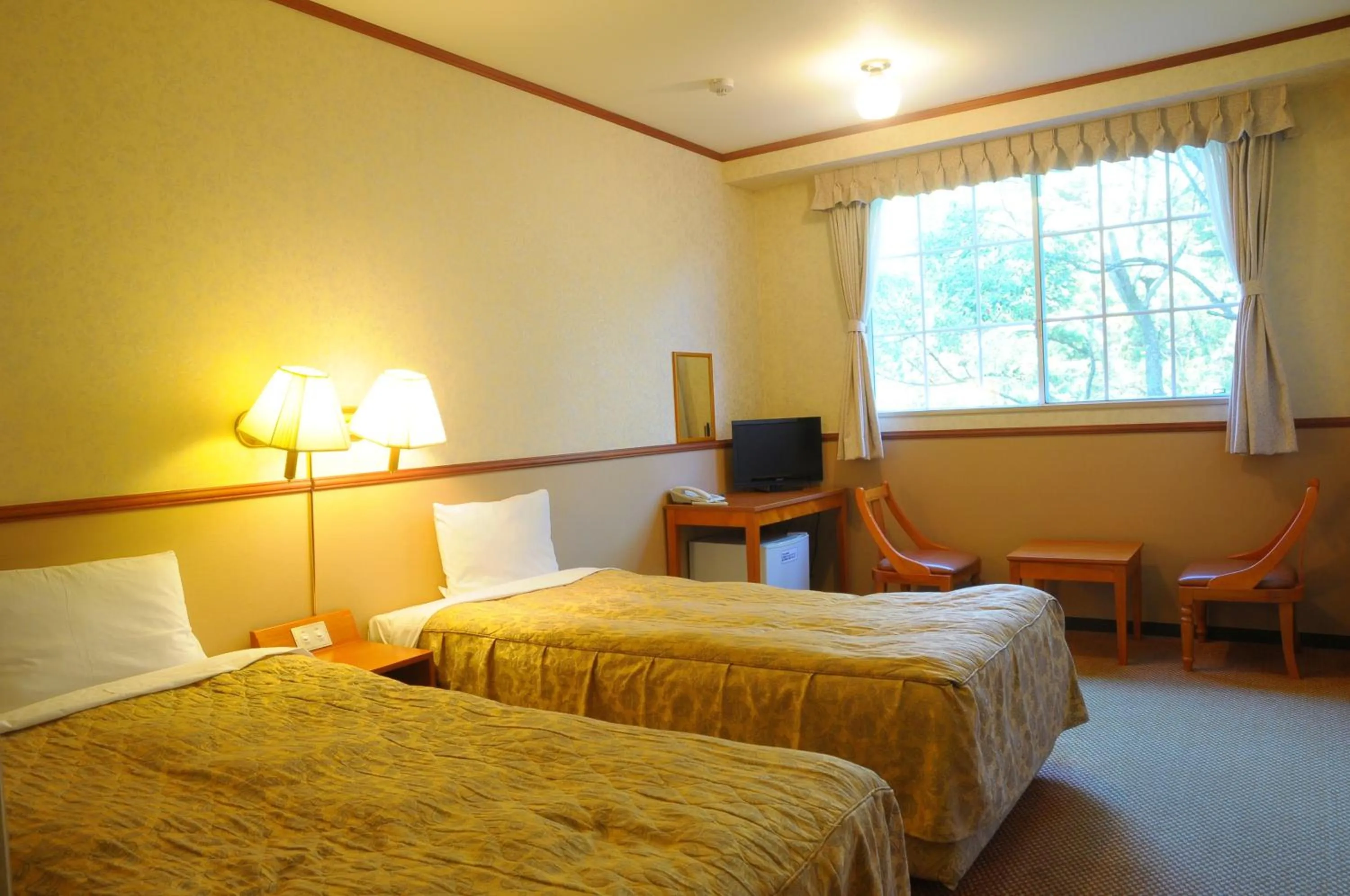 Photo of the whole room, Bed in Atami Hotel Paipuno Kemuri