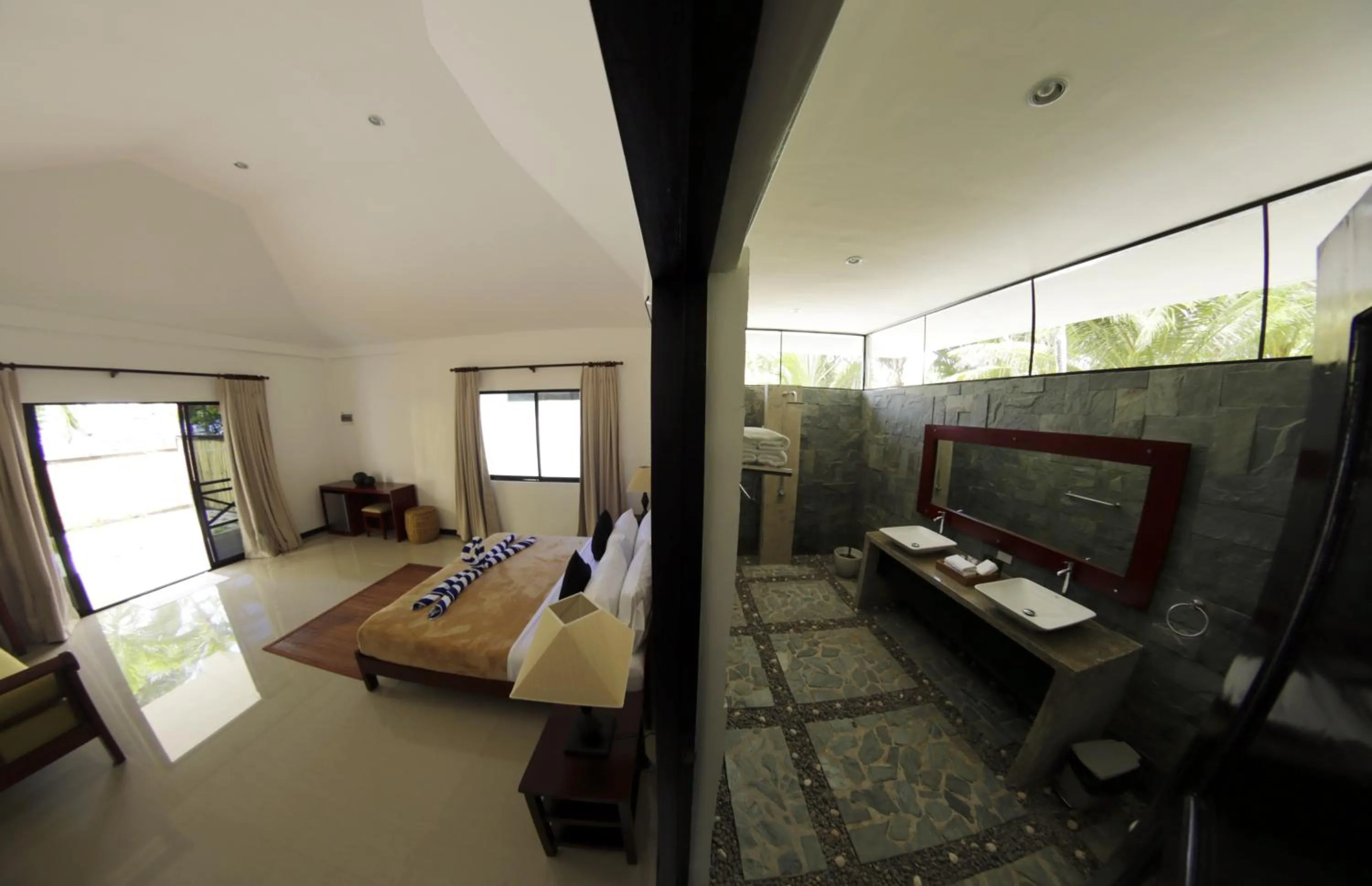 Bathroom, Bed in Cabilao Sanctuary Beach & Dive Resort