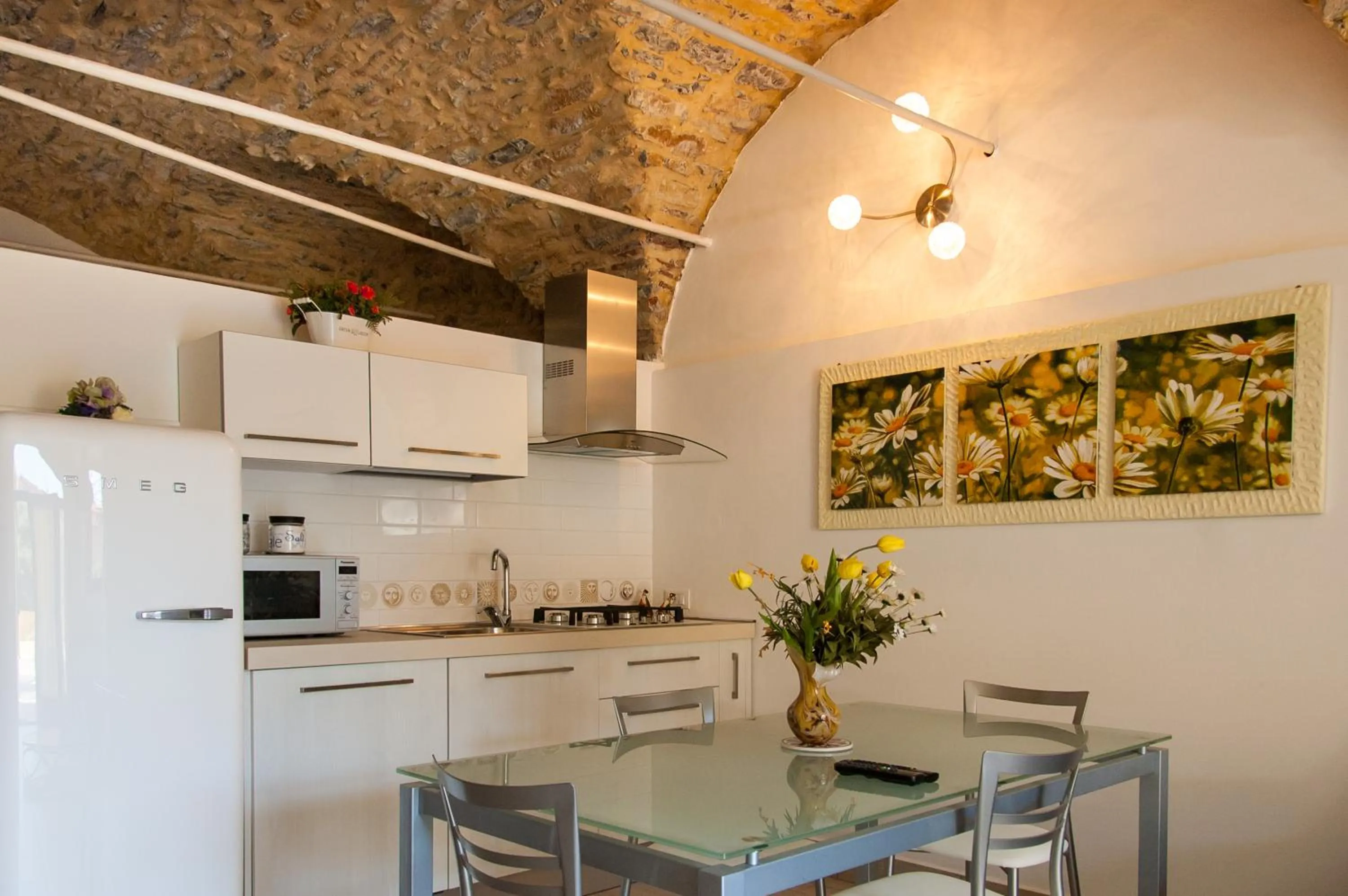 Kitchen or kitchenette in Appartamenti Antico Frantoio Doria
