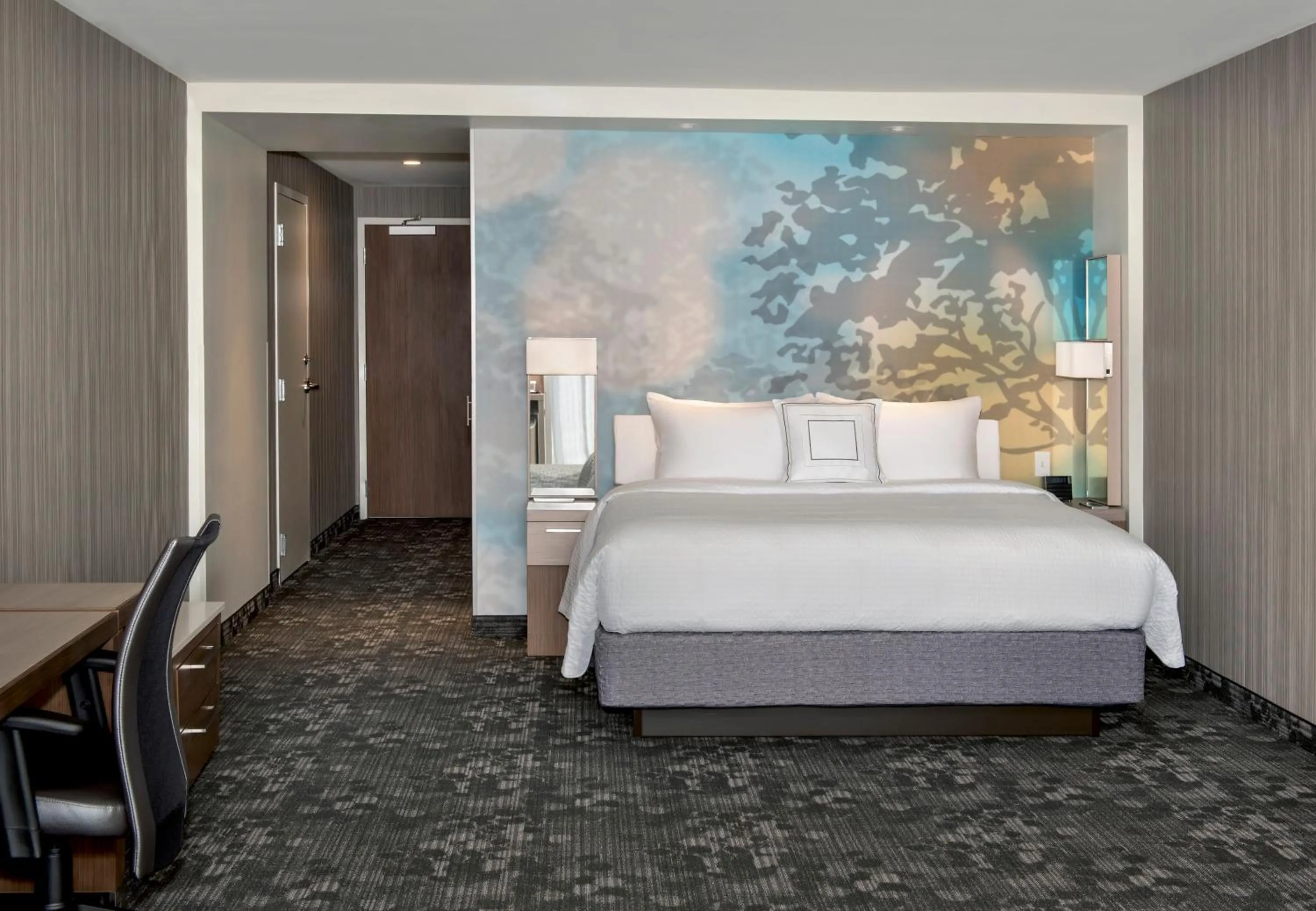 Bed in Courtyard by Marriott Schenectady at Mohawk Harbor