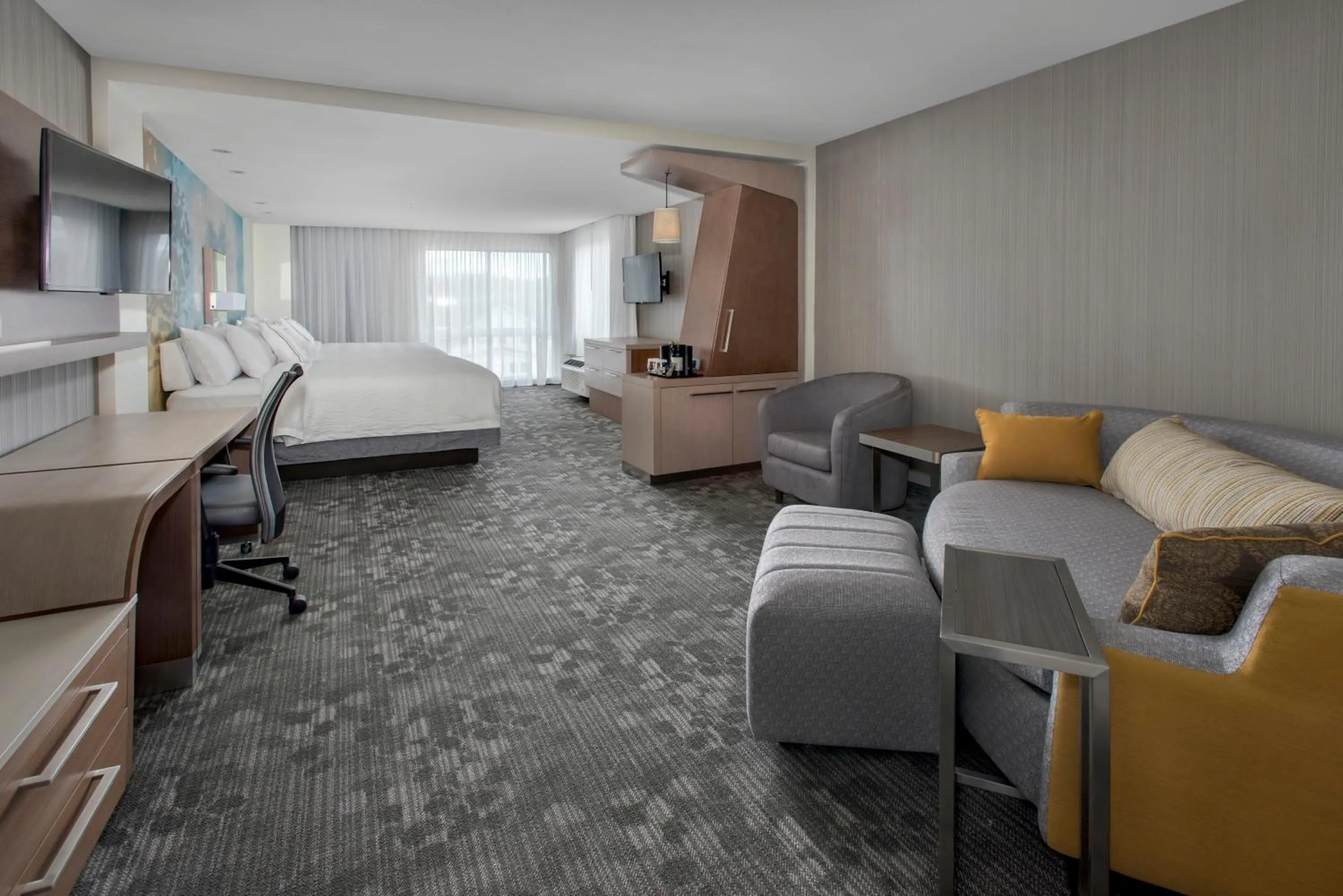 Bed in Courtyard by Marriott Schenectady at Mohawk Harbor