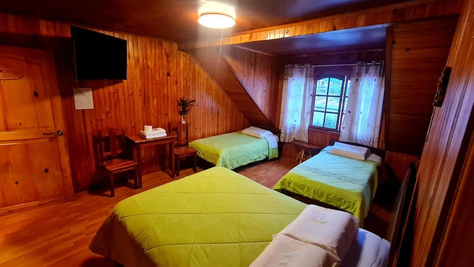 Bed in Tunki Lodge - Tours, Cabañas y Sauna