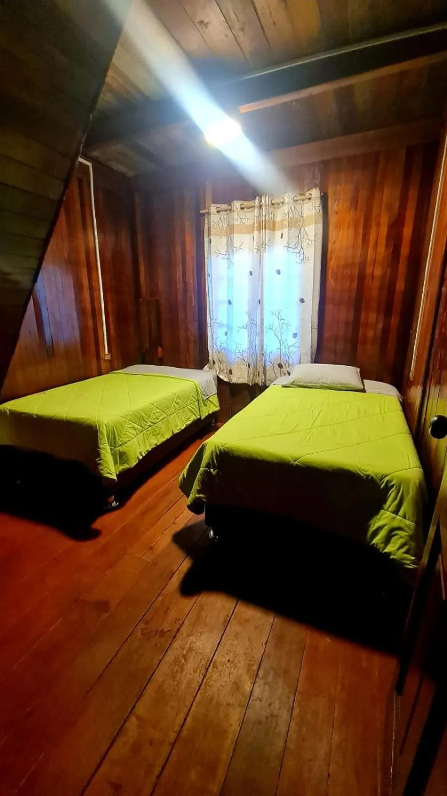Photo of the whole room, Bed in Tunki Lodge - Tours, Cabañas y Sauna