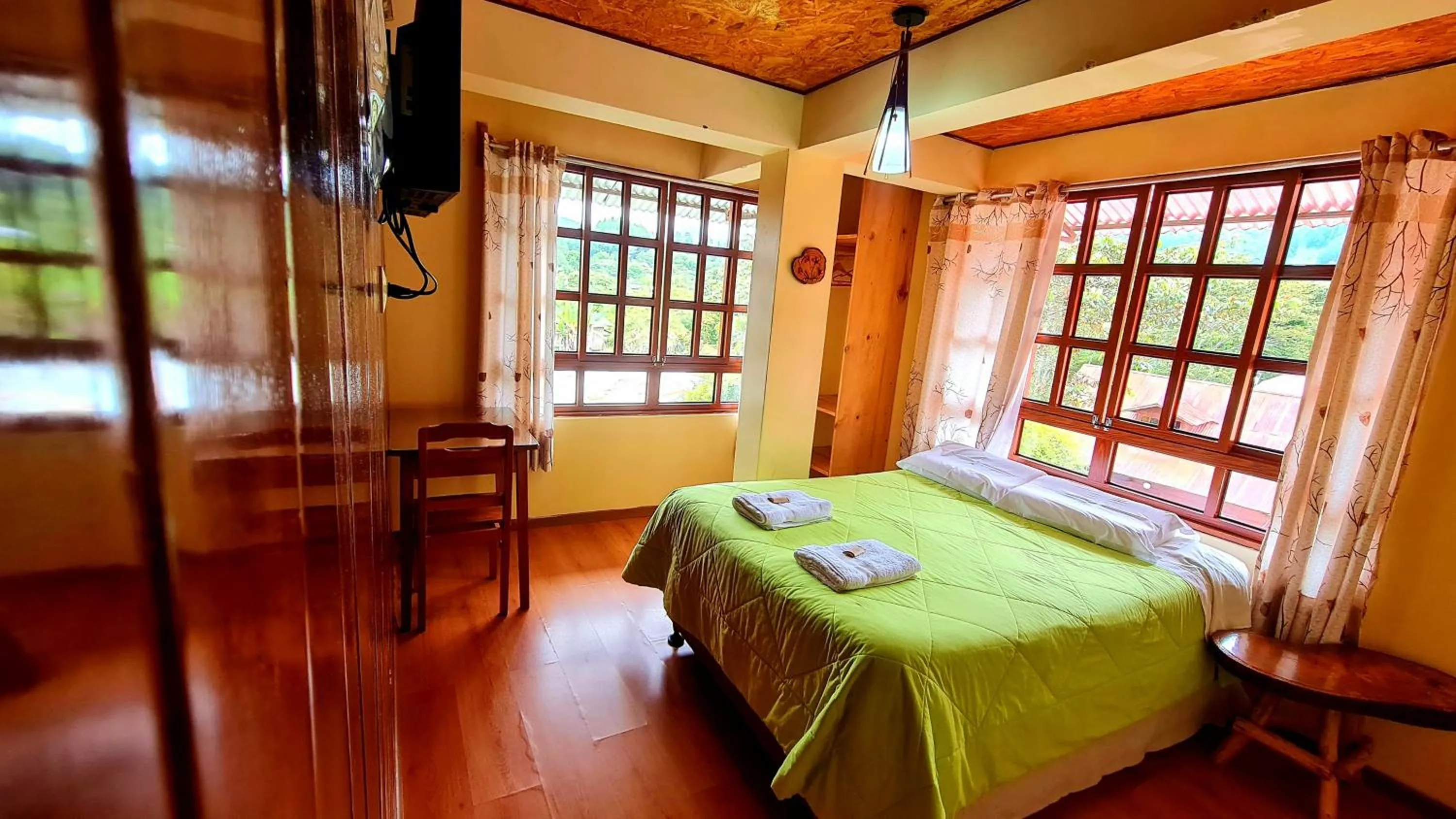 Bed in Tunki Lodge - Tours, Cabañas y Sauna