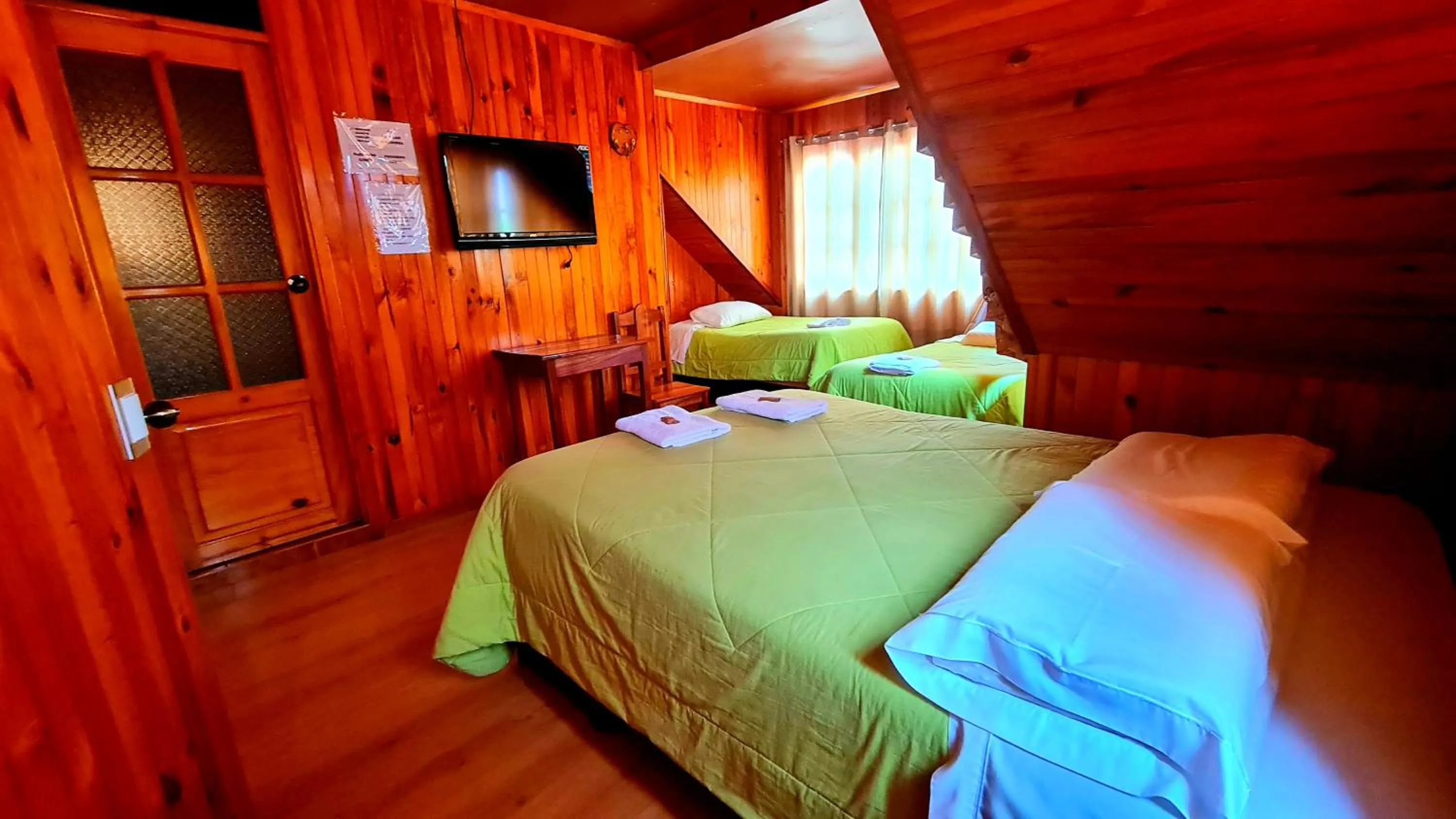 Bed in Tunki Lodge - Tours, Cabañas y Sauna