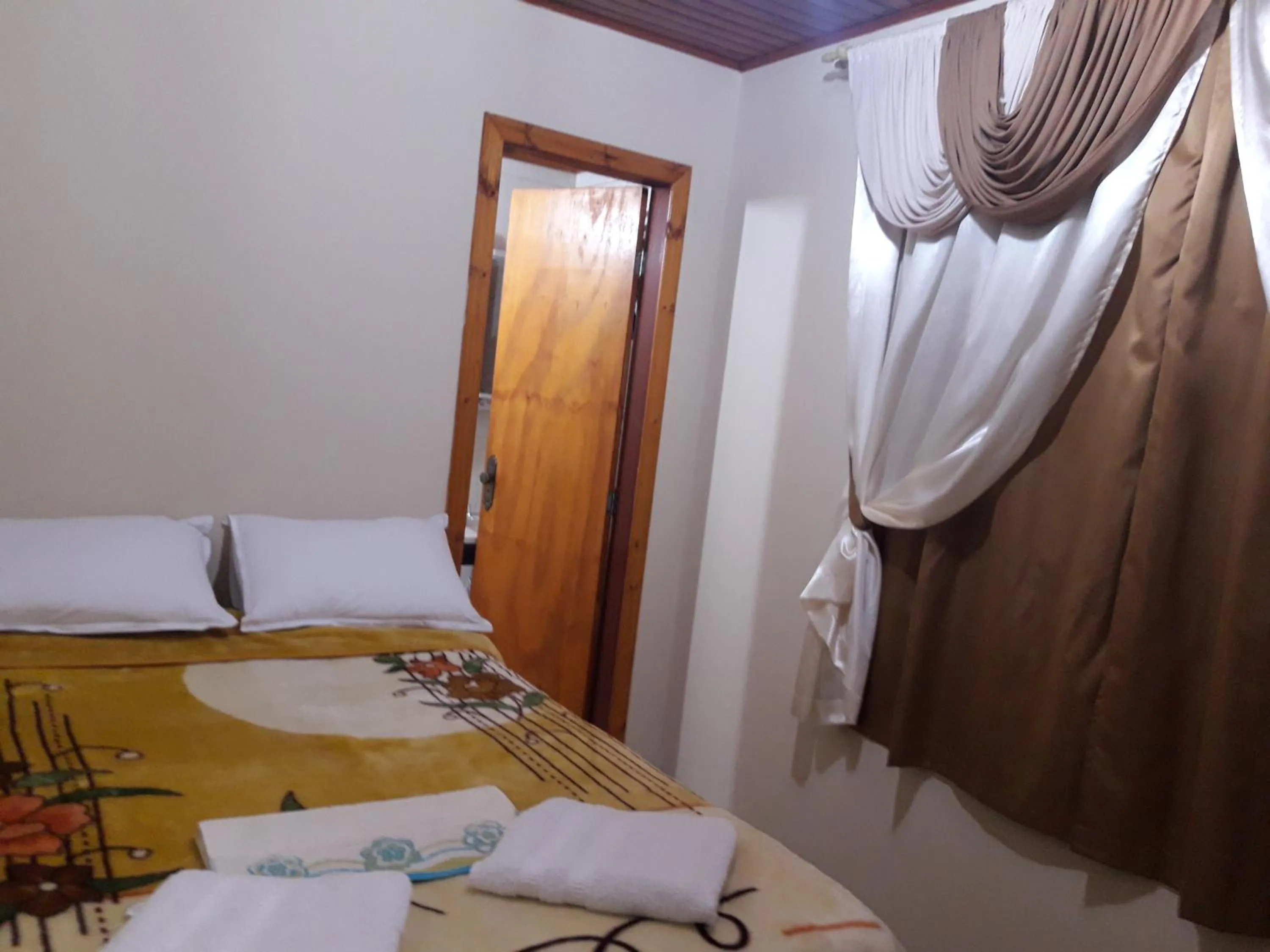 Bed in Pousada Viva Serra