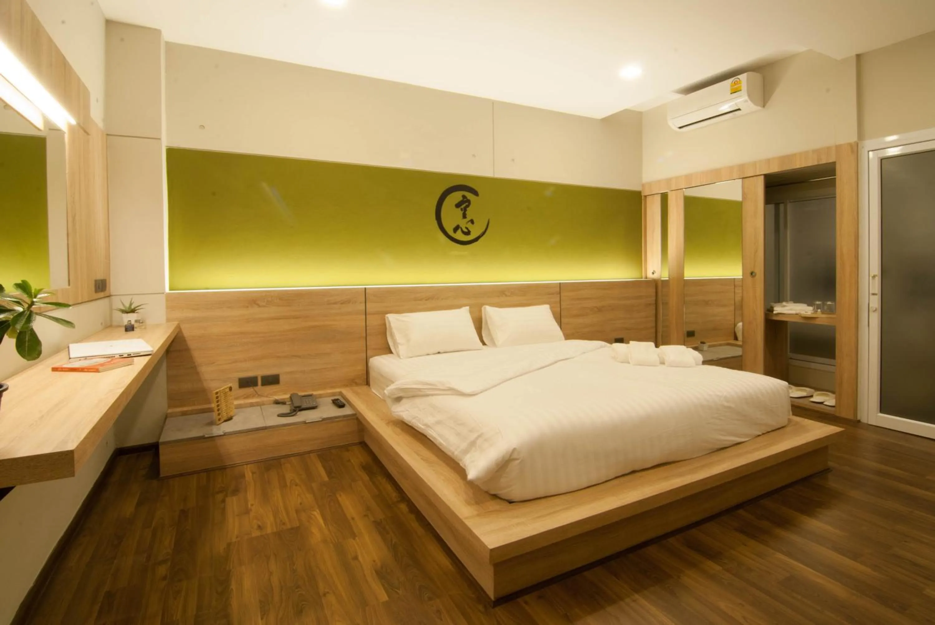 Bed in The Zenith Residence Hotel