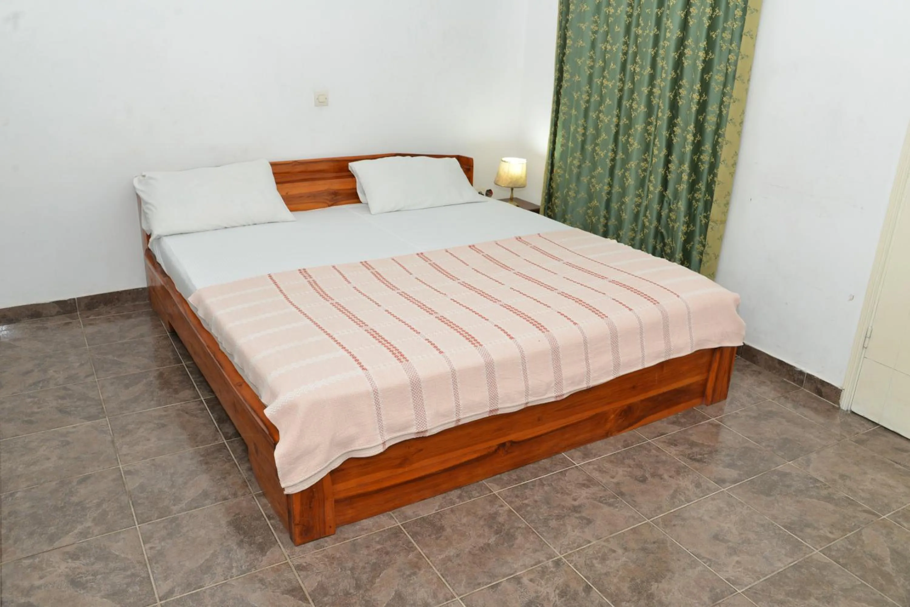 Bedroom in Hotel Residence Lobal