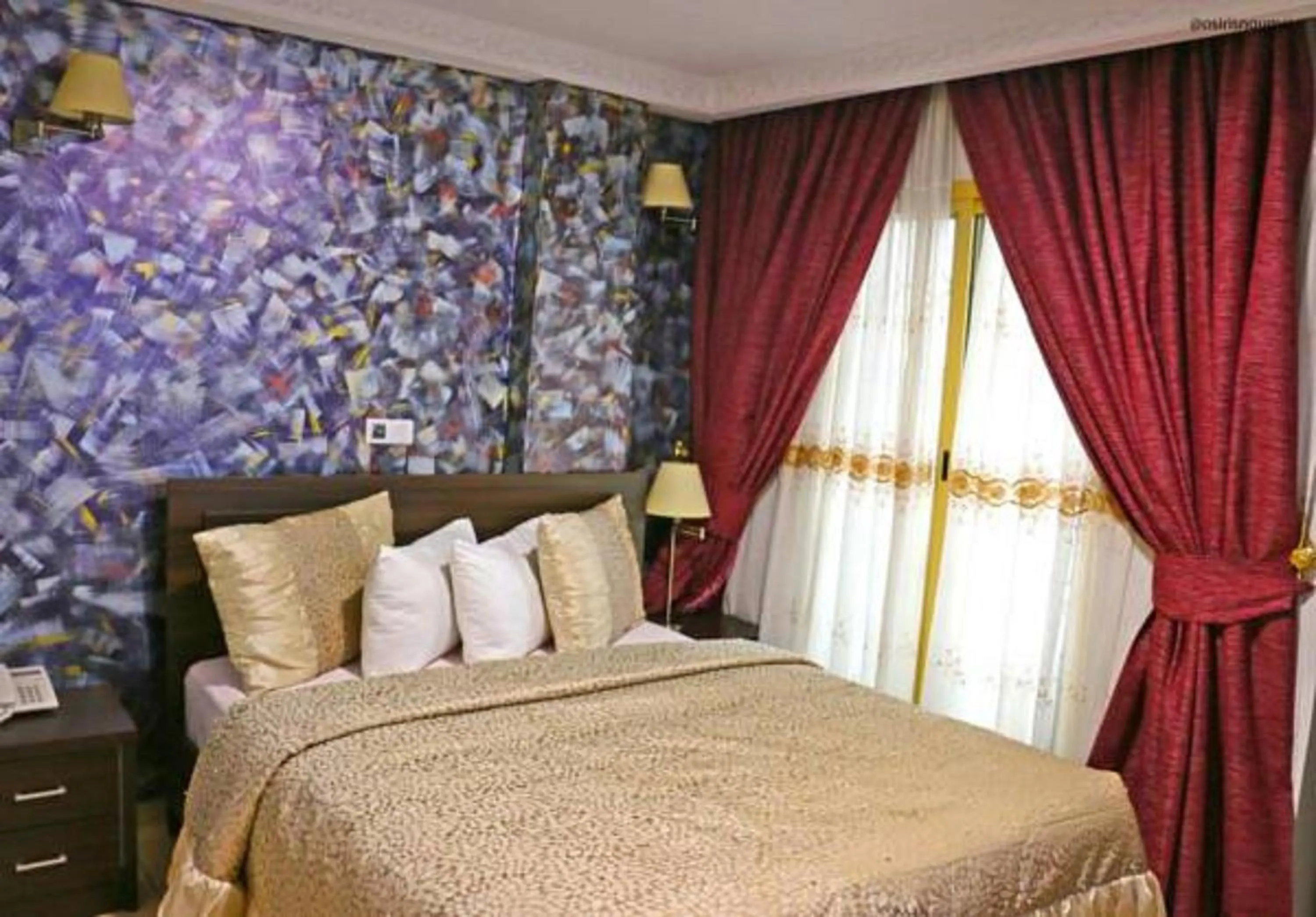 Bed in Noubou International Hotel
