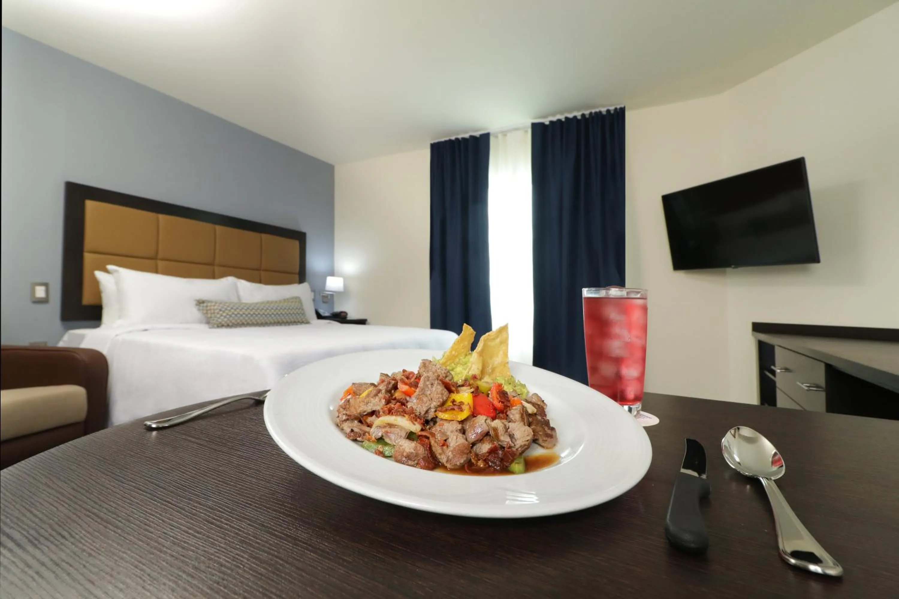 Photo of the whole room, Bed in Candlewood Suites - Celaya by IHG