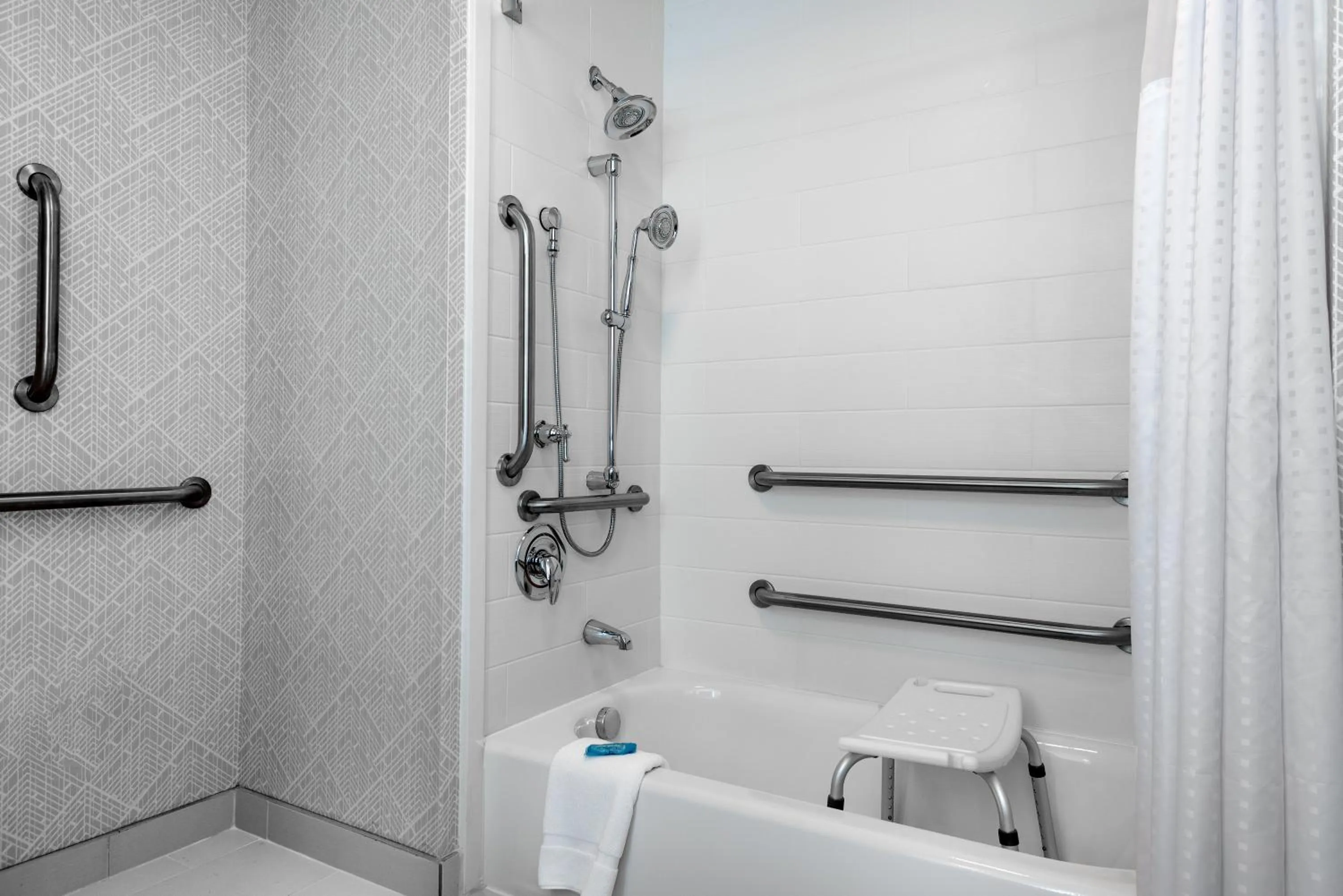 Bathroom in Holiday Inn Express & Suites - Charlotte Airport by IHG