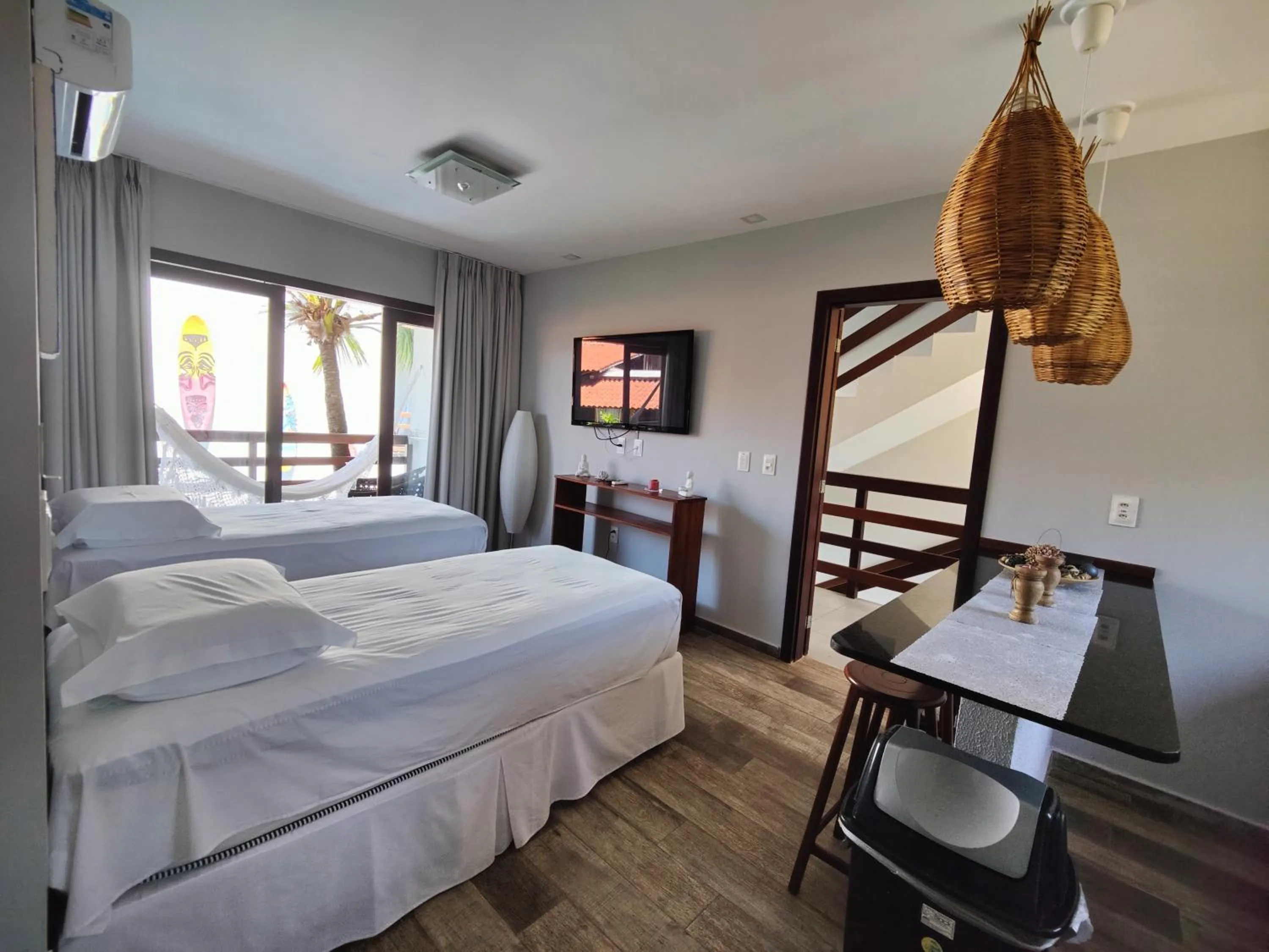 Bed in Pousada Waikiki Boutique