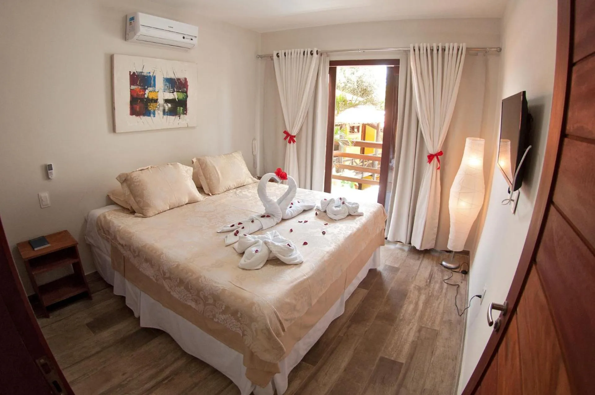 Living room, Bed in Pousada Waikiki Boutique