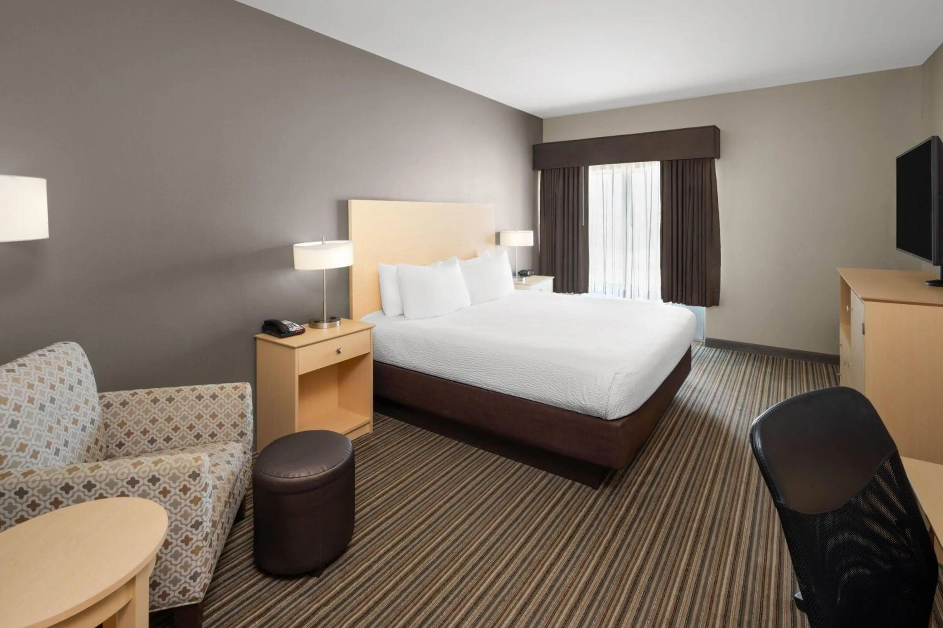 Photo of the whole room, Bed in Stone Hill Norman, Trademark Collection by Wyndham