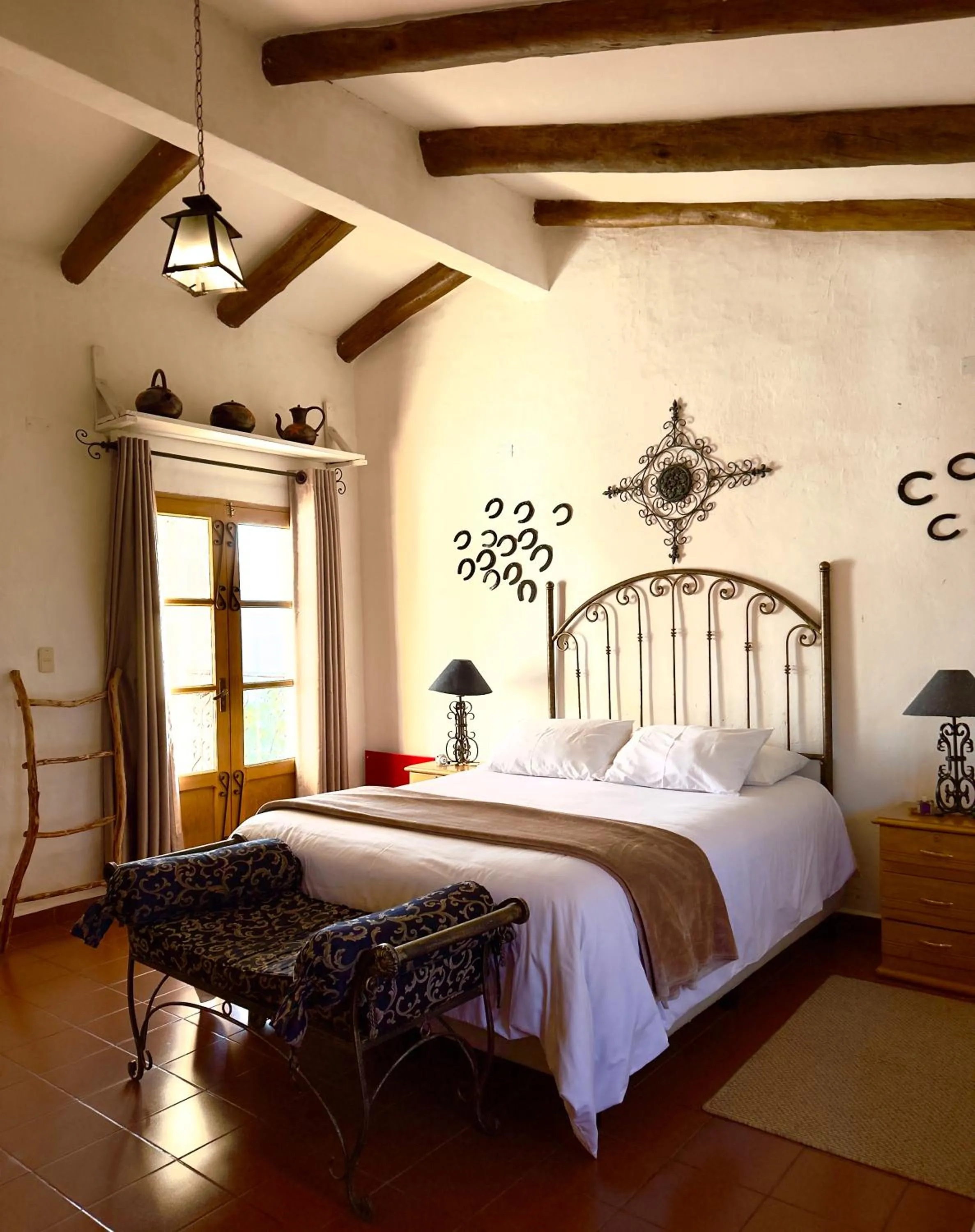Bed in El Pueblito Hotel Boutique