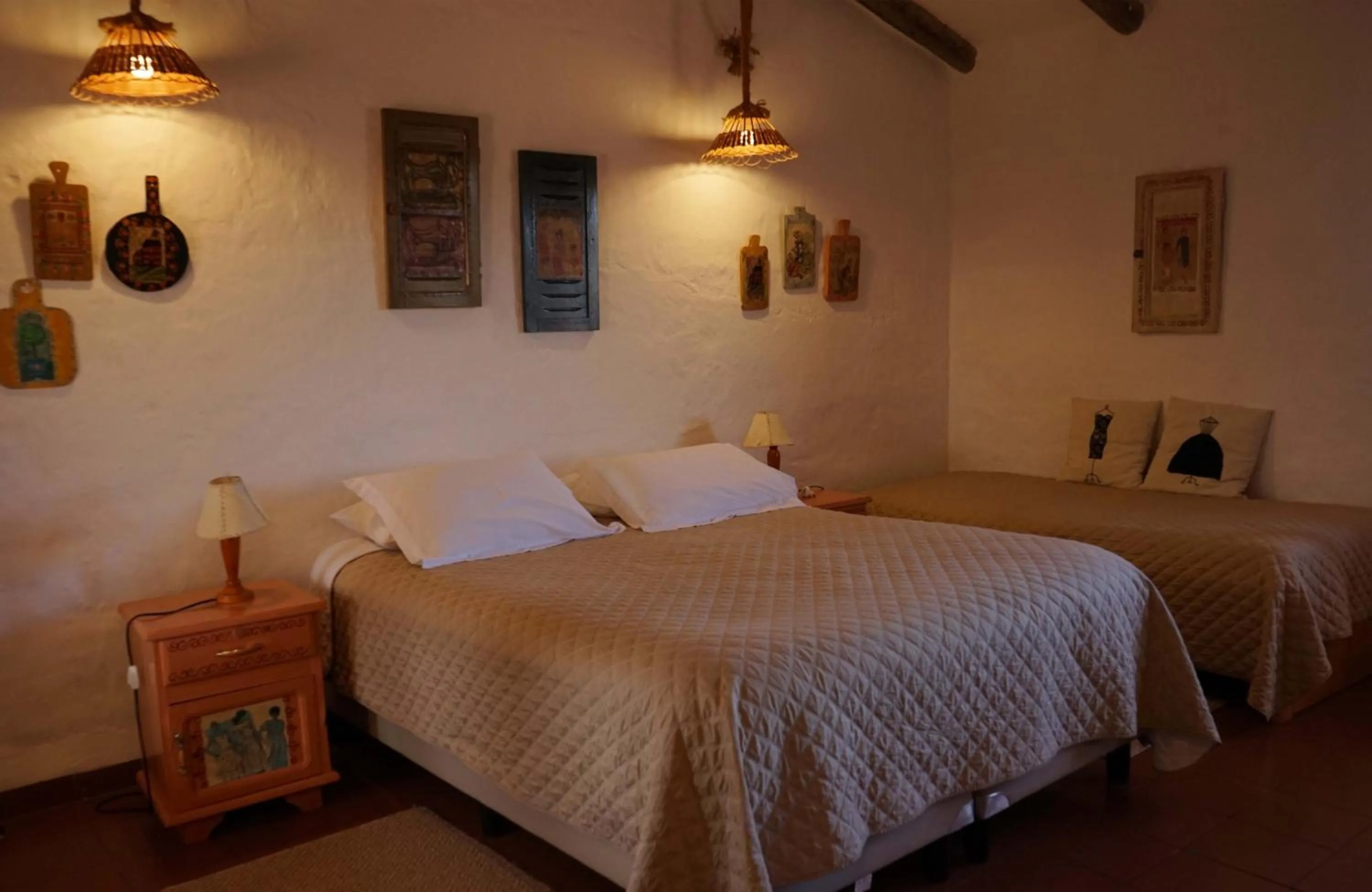 Bed in El Pueblito Hotel Boutique
