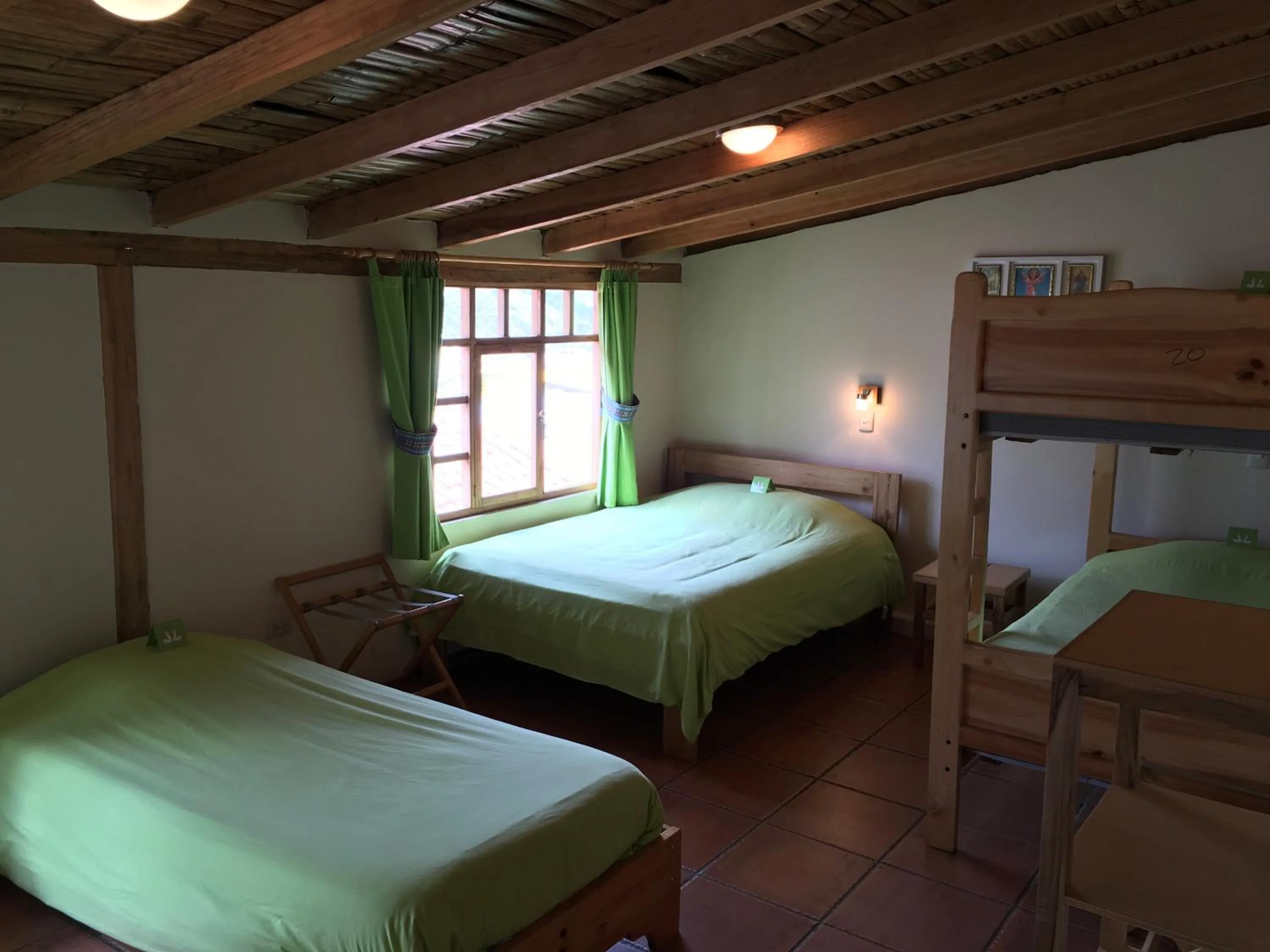 Bedroom, Bed in Inti Sisa Art Guesthouse