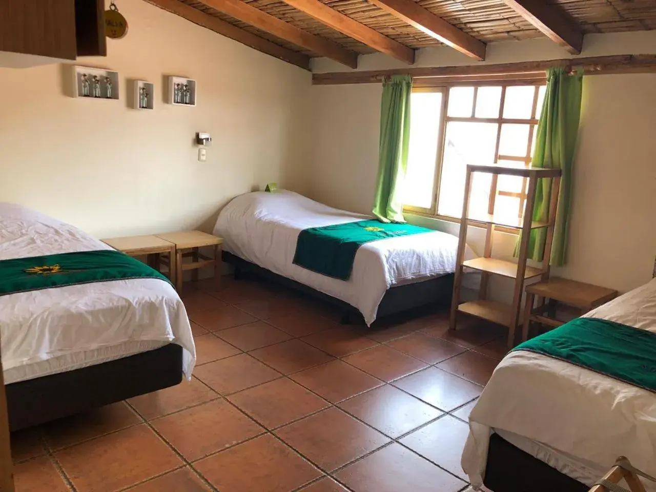 Triple Room with Private Bathroom in Inti Sisa Art Guesthouse Triple Room with Private Bathroom in Inti Sisa Art Guesthouse