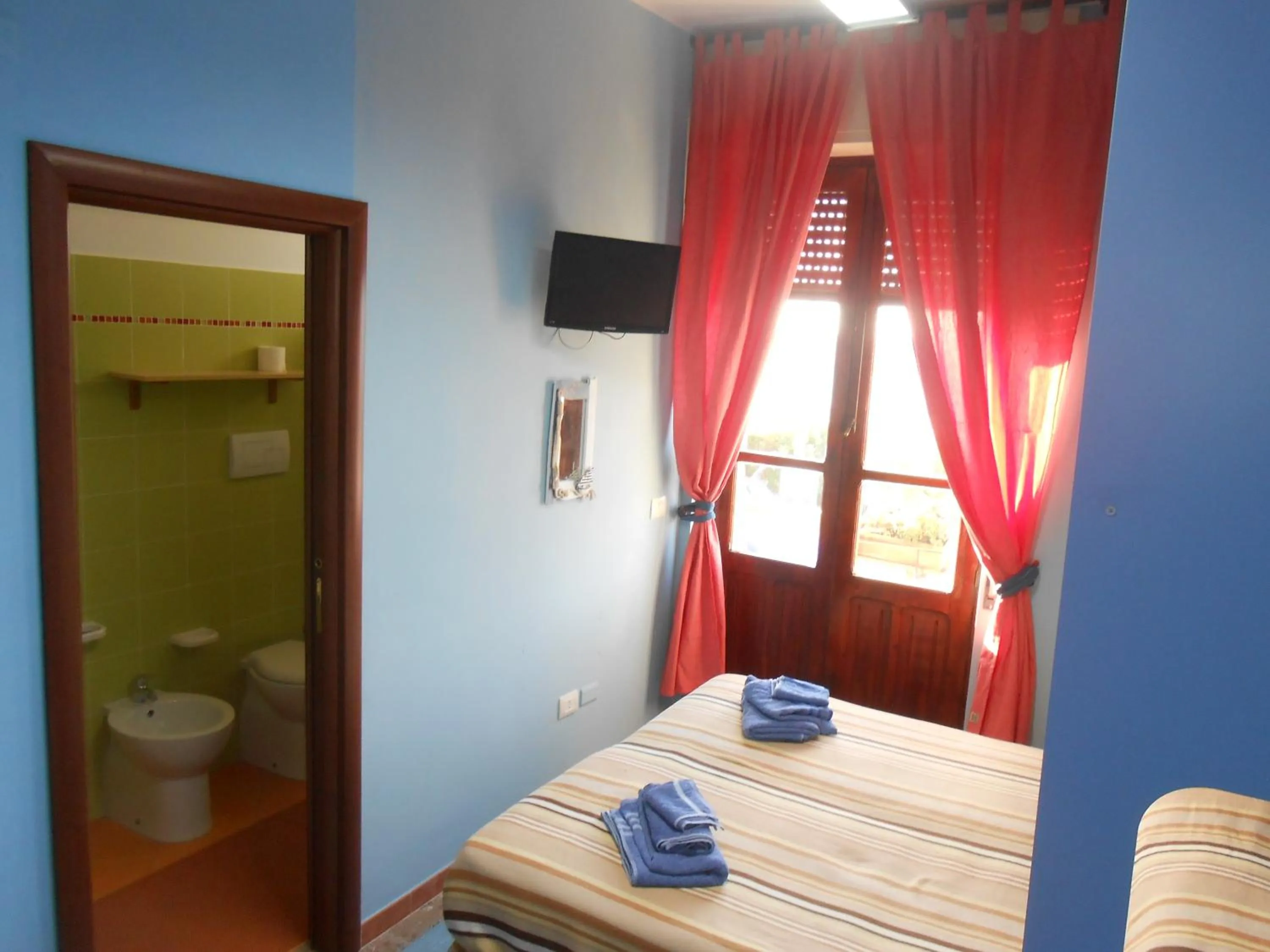 Bedroom in B&B Ro.Ma.