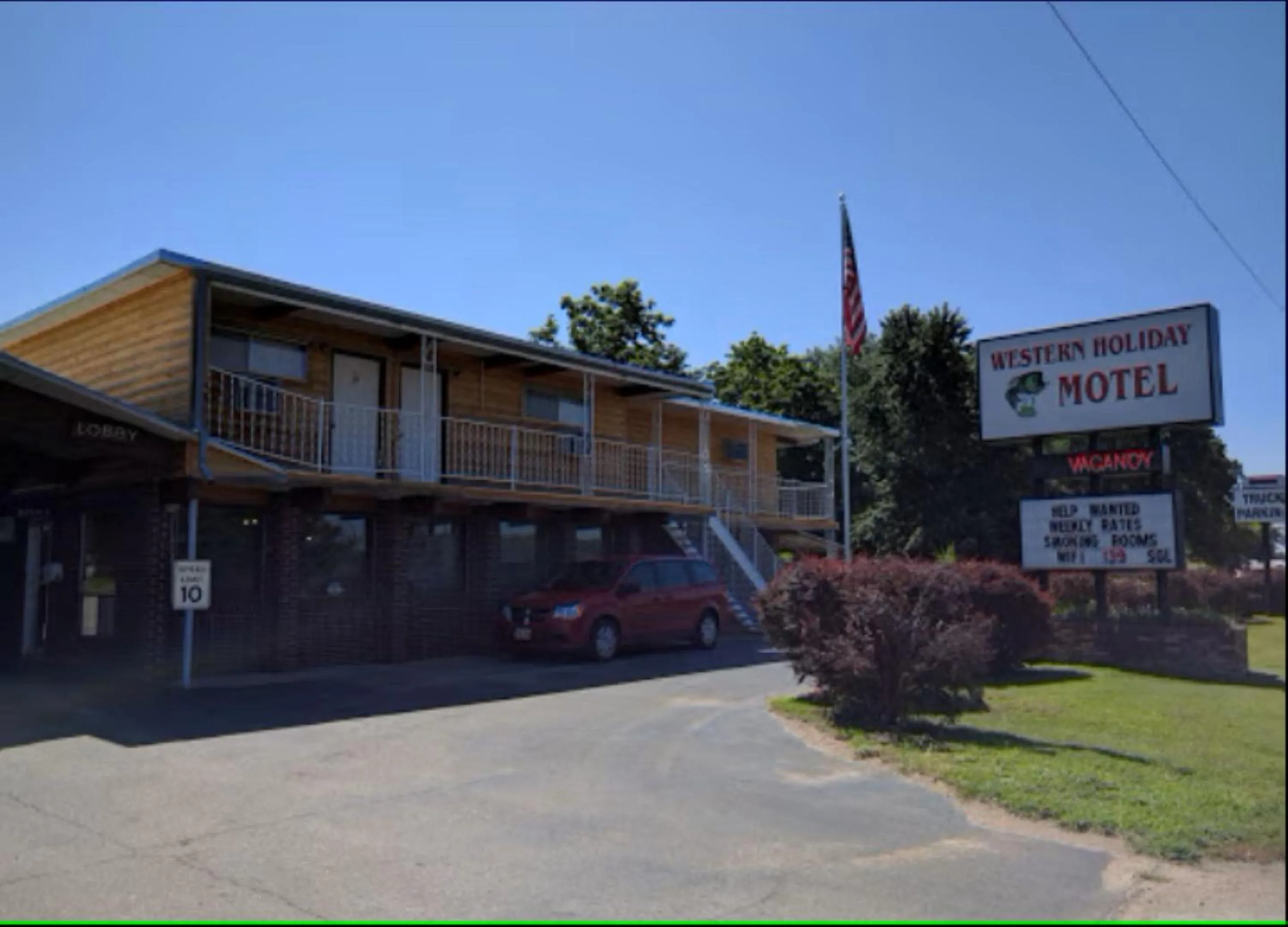 Facade/entrance in Love Hotels Western Holiday by OYO at Harlan Lake NE