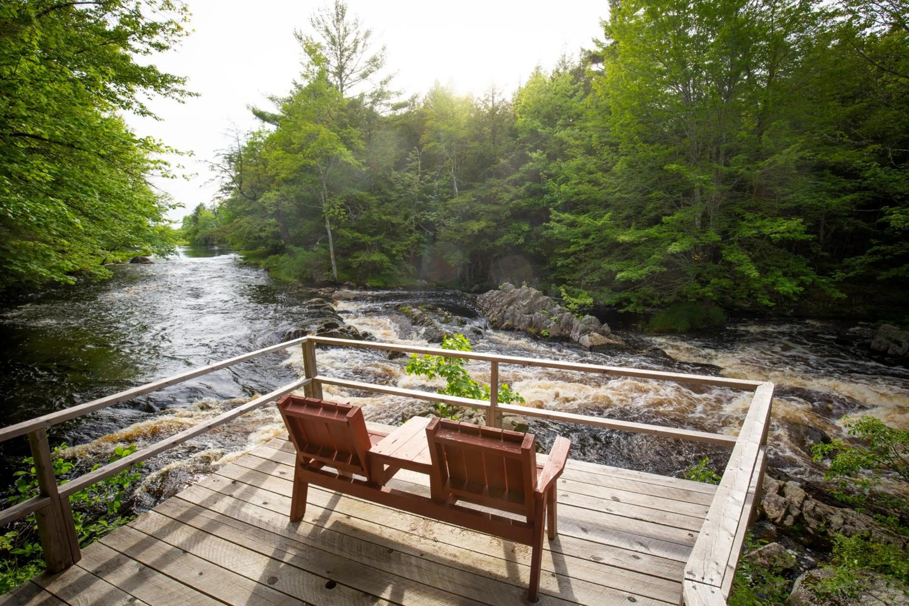 Seating area in Mersey River Chalets a nature retreat
