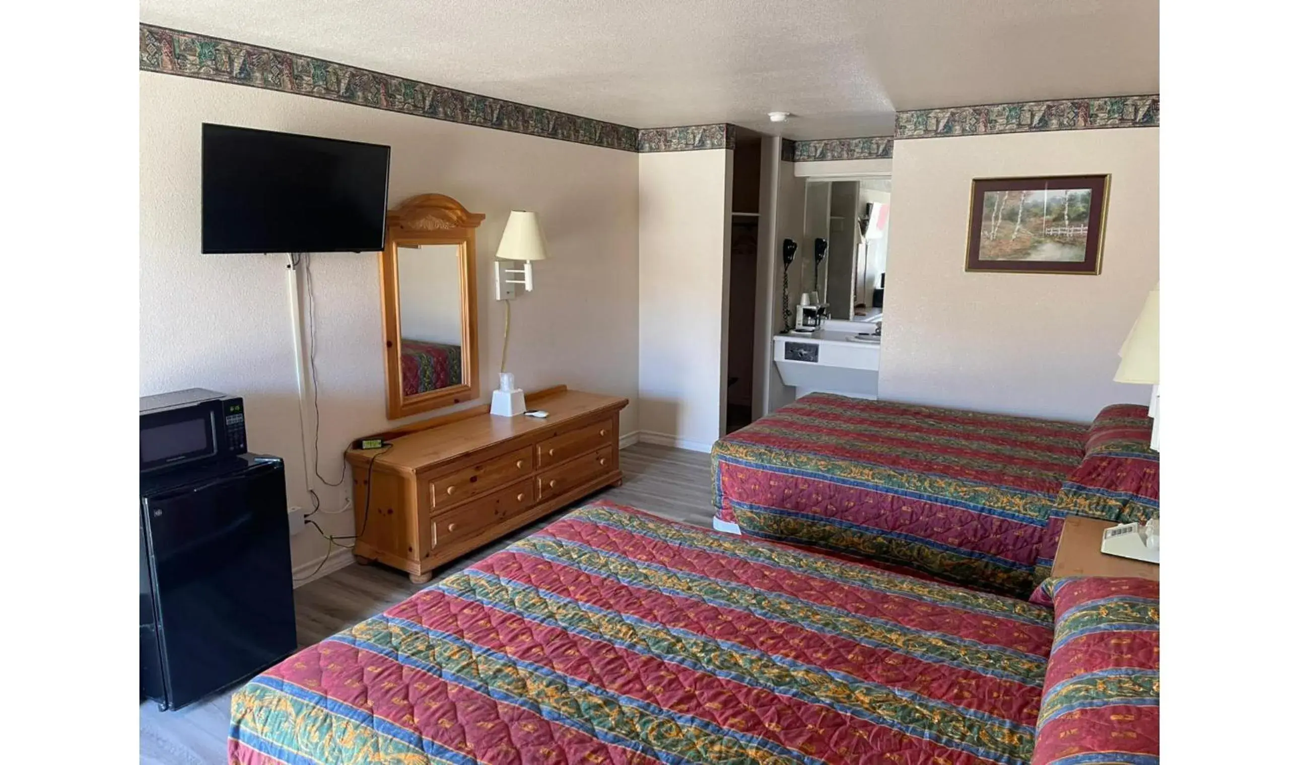 Bedroom, Bed in Lakeside inn & suites by OYO Mathis I 37 Bedroom, Bed in Lakeside inn & suites by OYO Mathis I 37