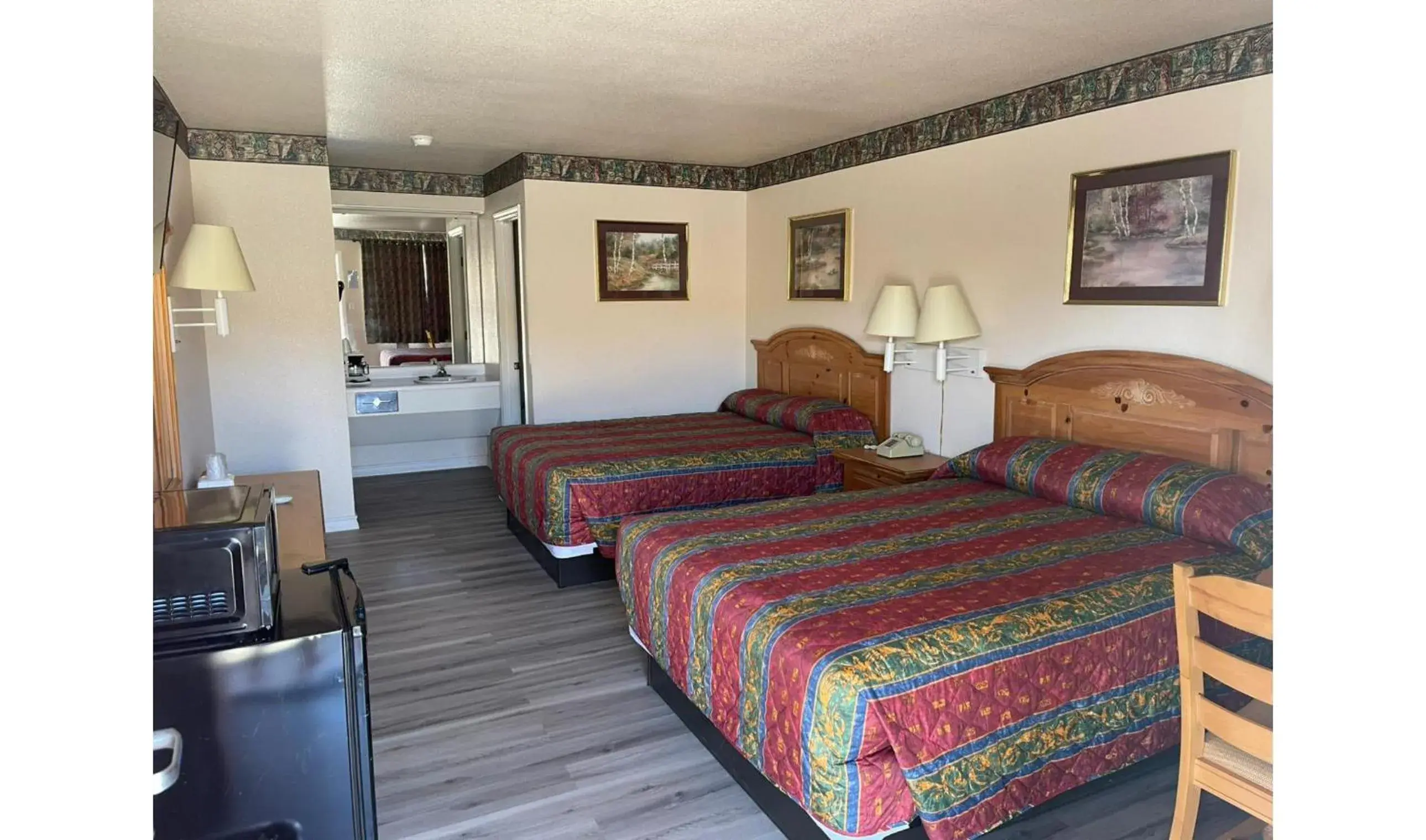 Bedroom, Bed in Lakeside inn & suites by OYO Mathis I 37 Bedroom, Bed in Lakeside inn & suites by OYO Mathis I 37