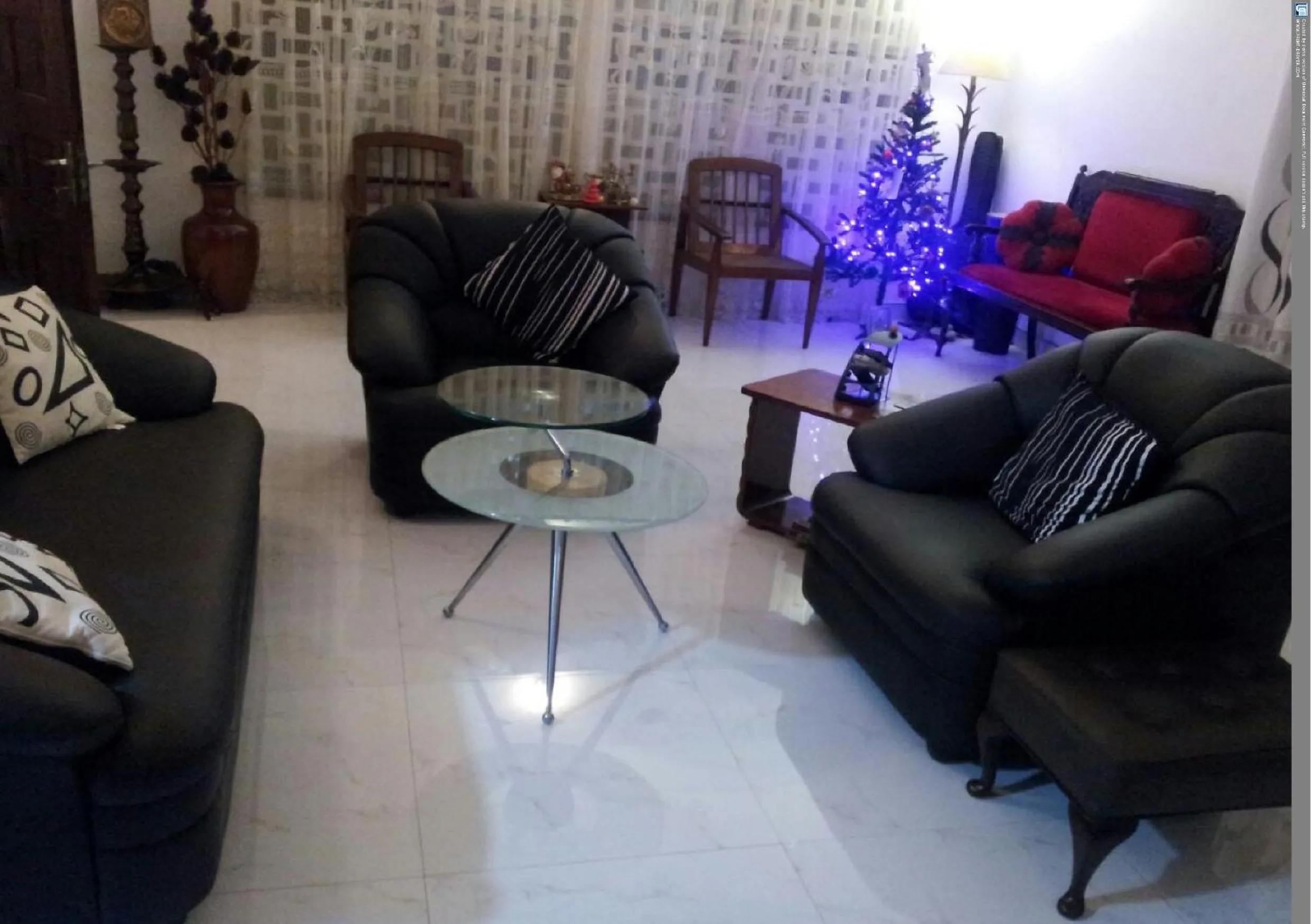 Communal lounge/ TV room in Number 01 by Taprobane