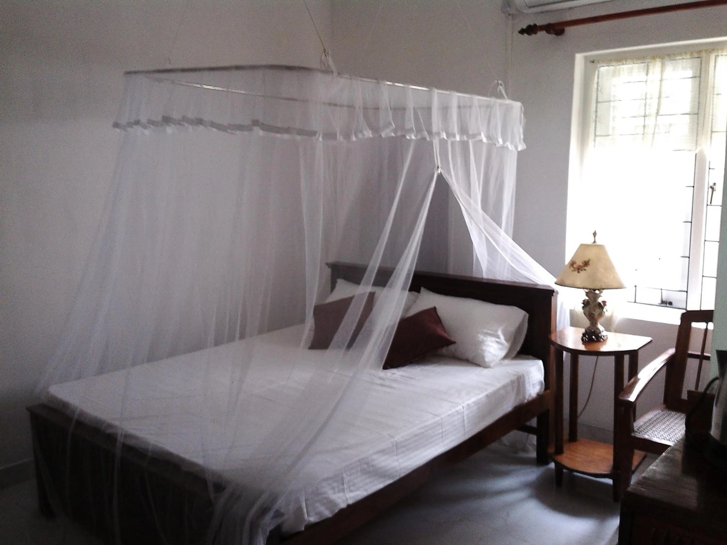 Bed in Number 01 by Taprobane