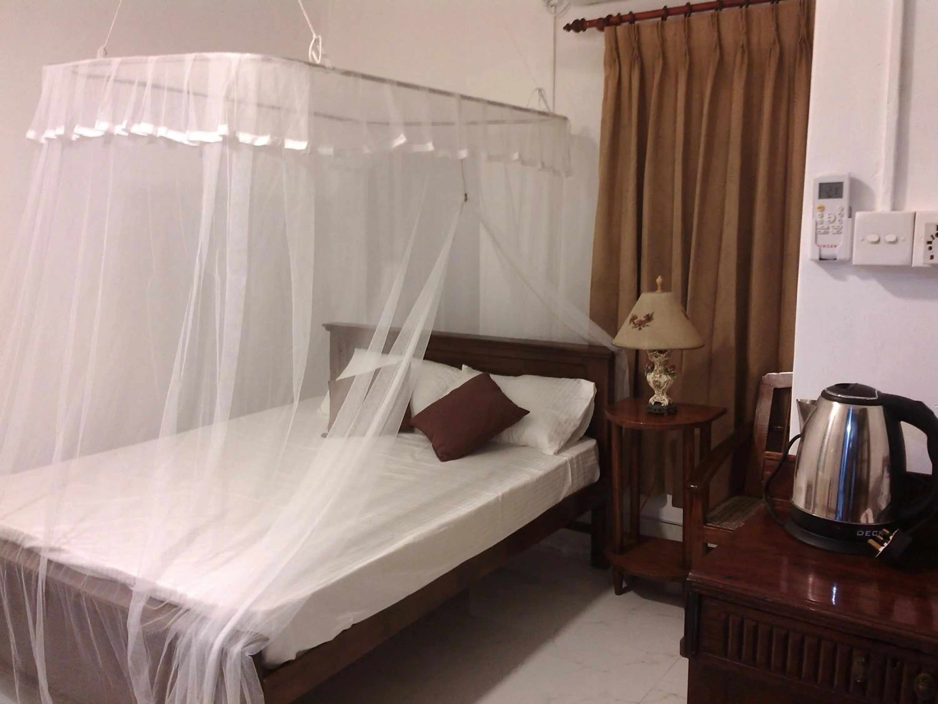 Bed in Number 01 by Taprobane