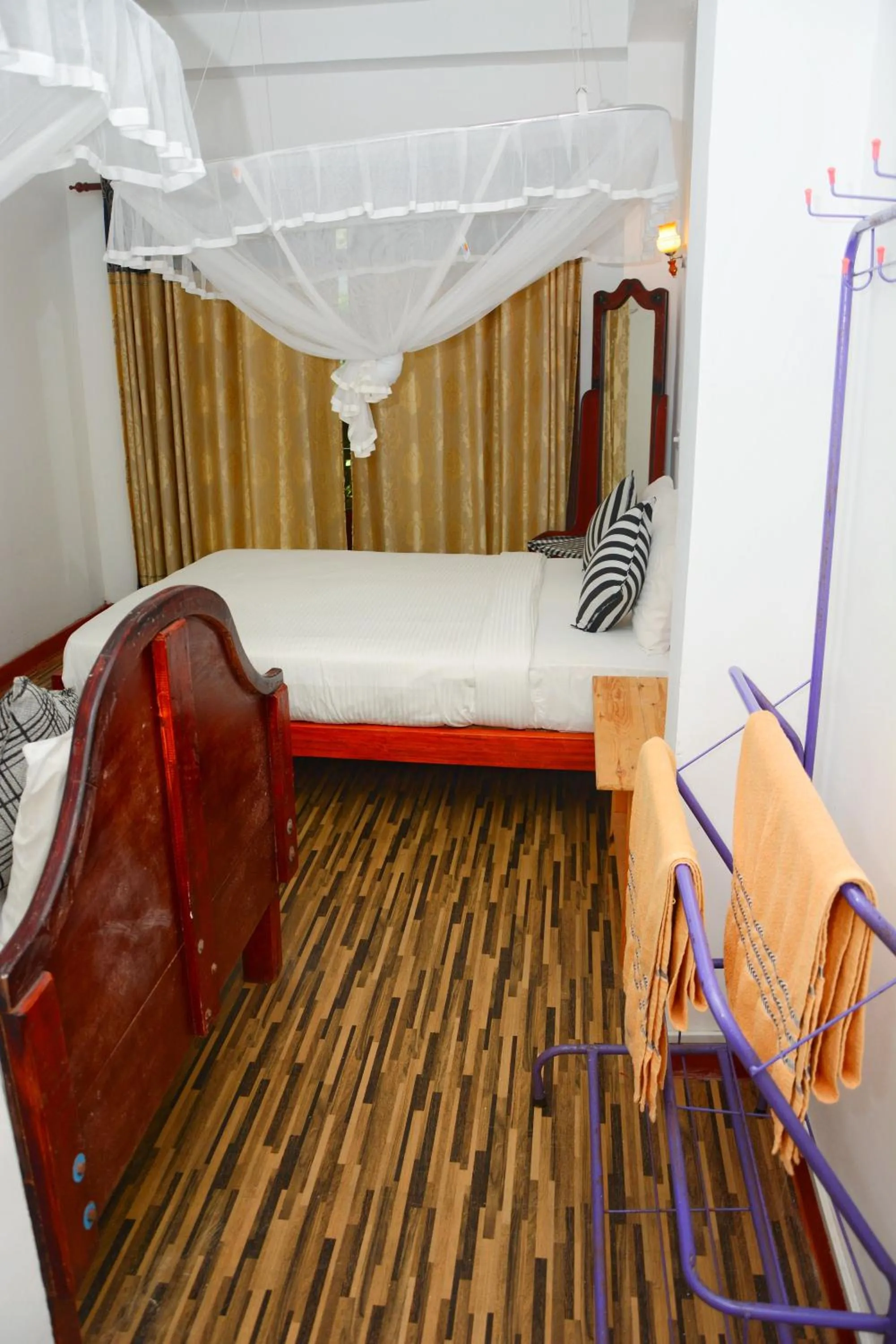 Bed in Maleesha Homestay