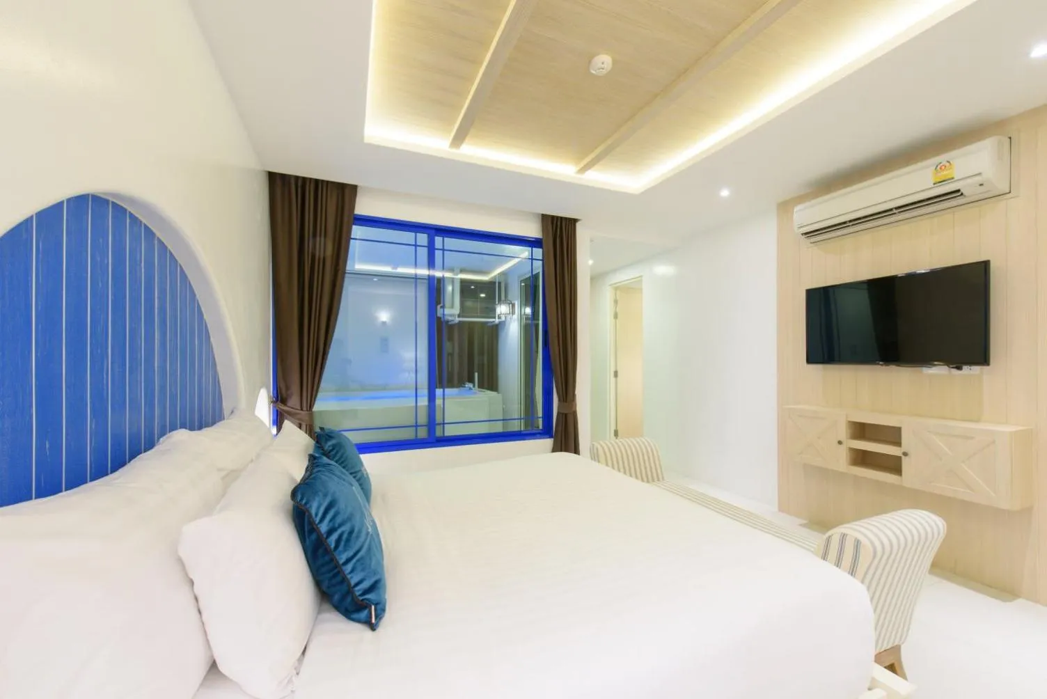 Communal lounge/ TV room, Bed in Costa Village Bangsaray