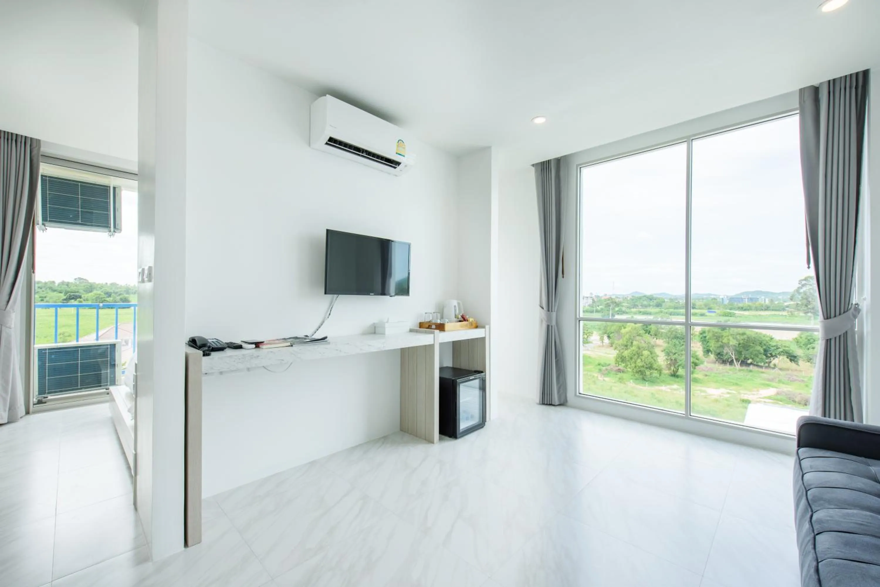 Communal lounge/ TV room in Costa Village Bangsaray