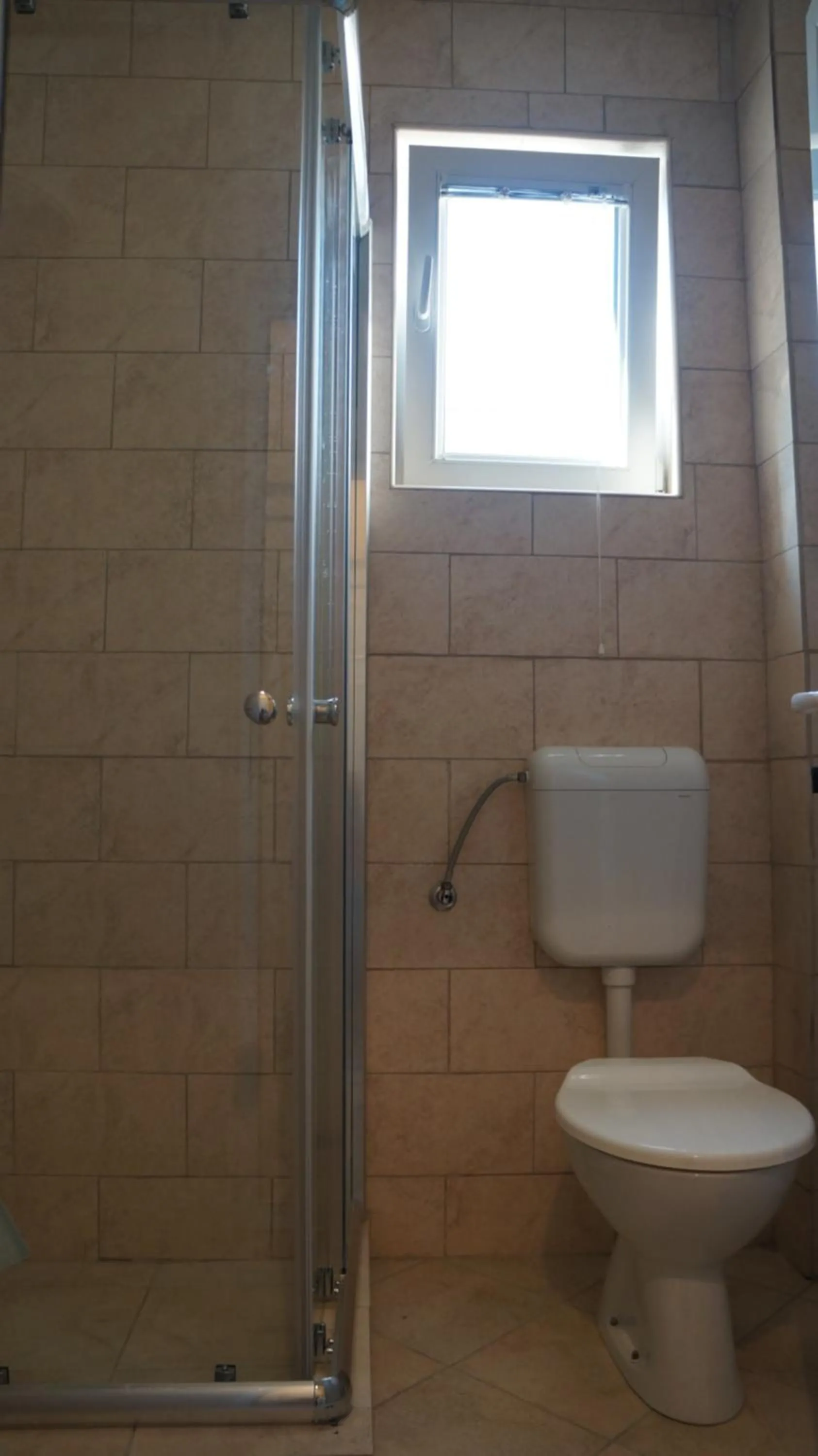 Toilet in Apartments Lora