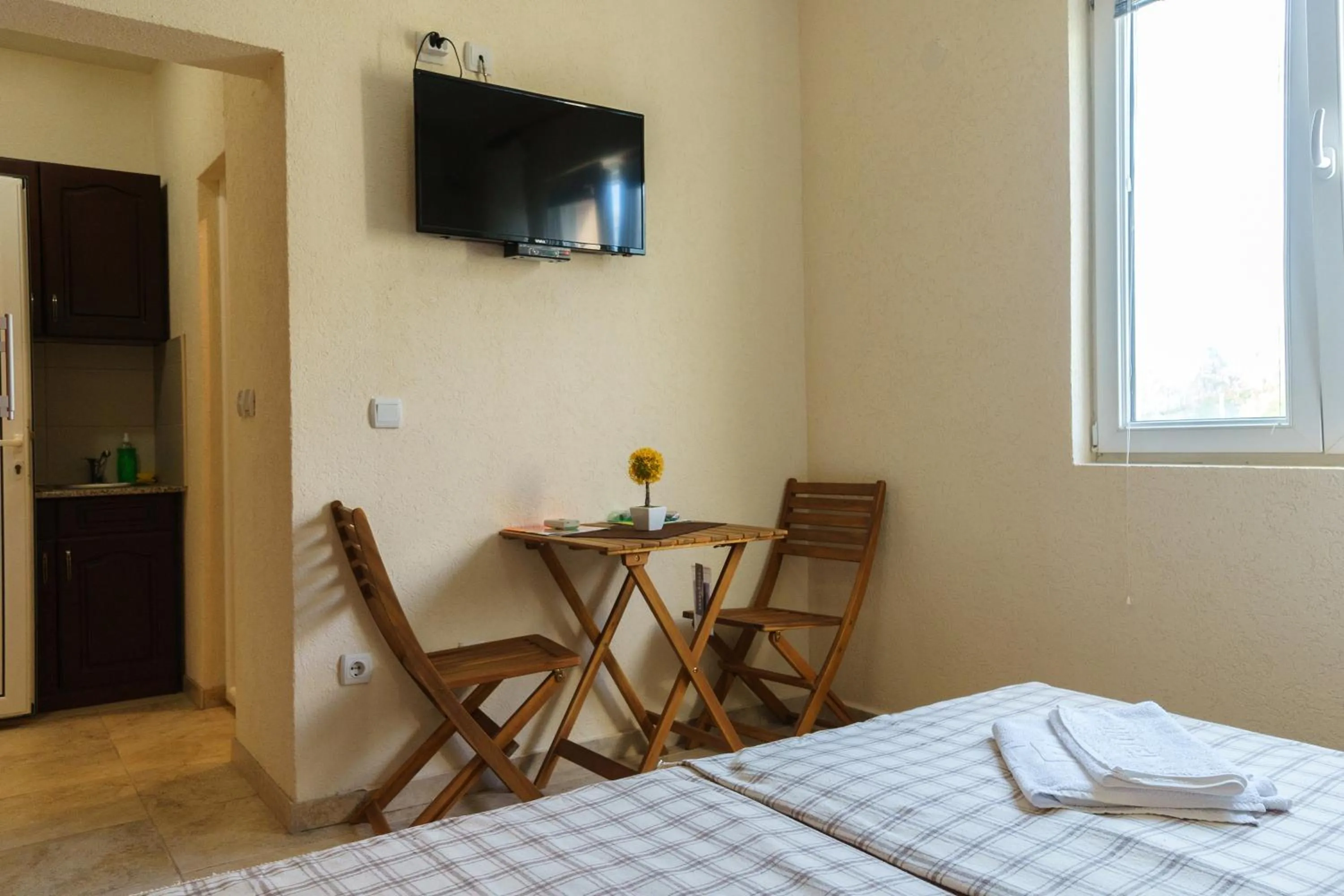 Dining area, Bed in Apartments Lora