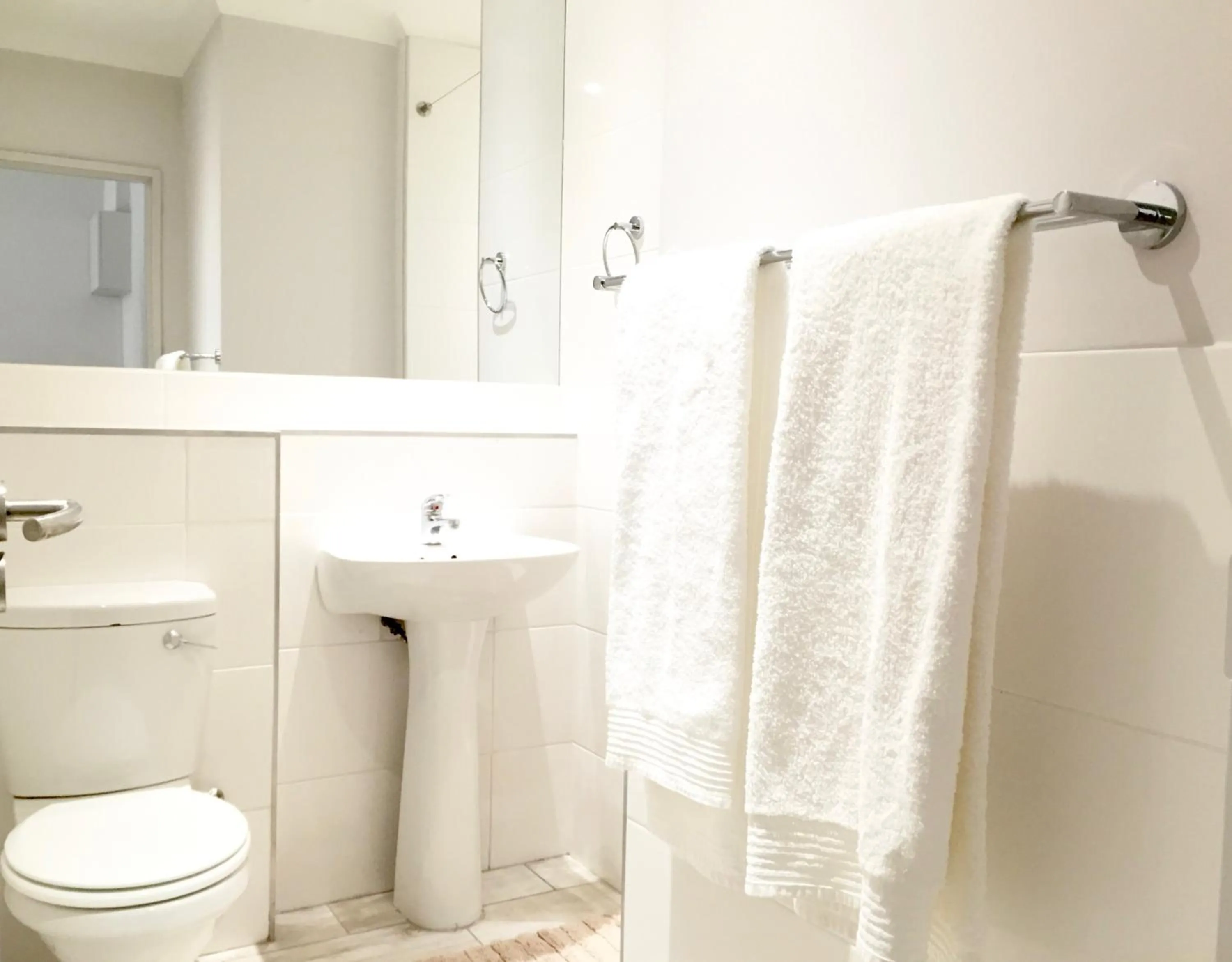 Toilet in Urban Oasis At The Four Seasons