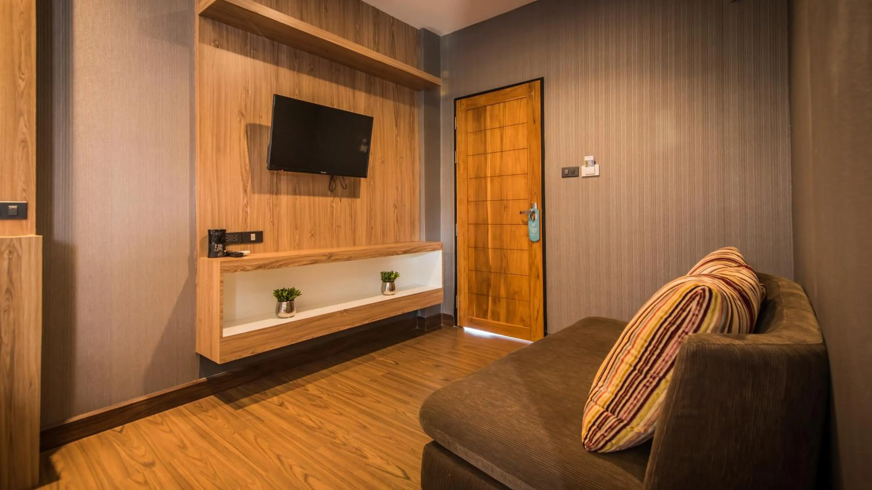 Communal lounge/ TV room in Le Terrarium Bed & Sleep Chiang Rai