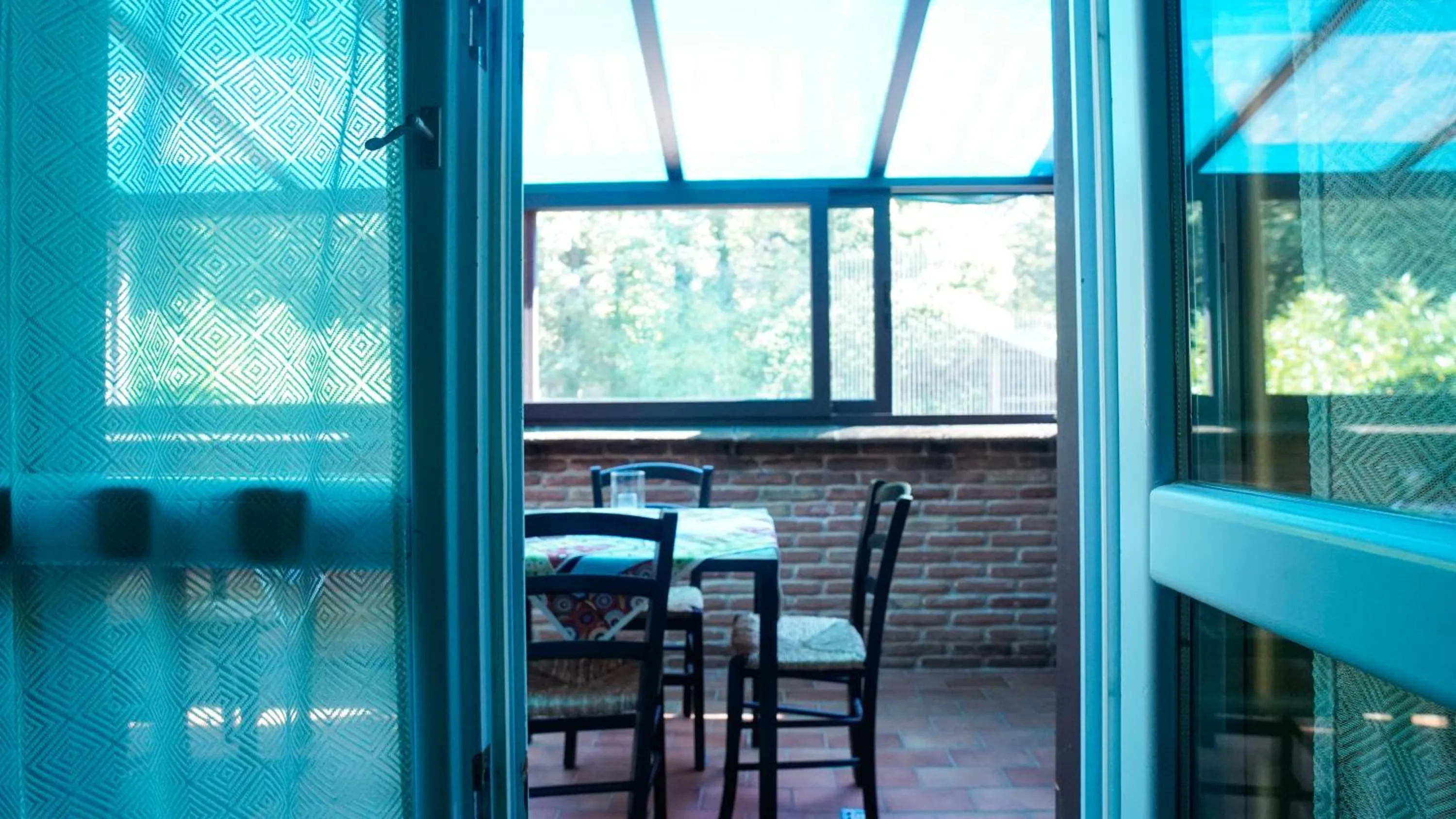 Communal lounge/ TV room in Rifugio Nel Bosco