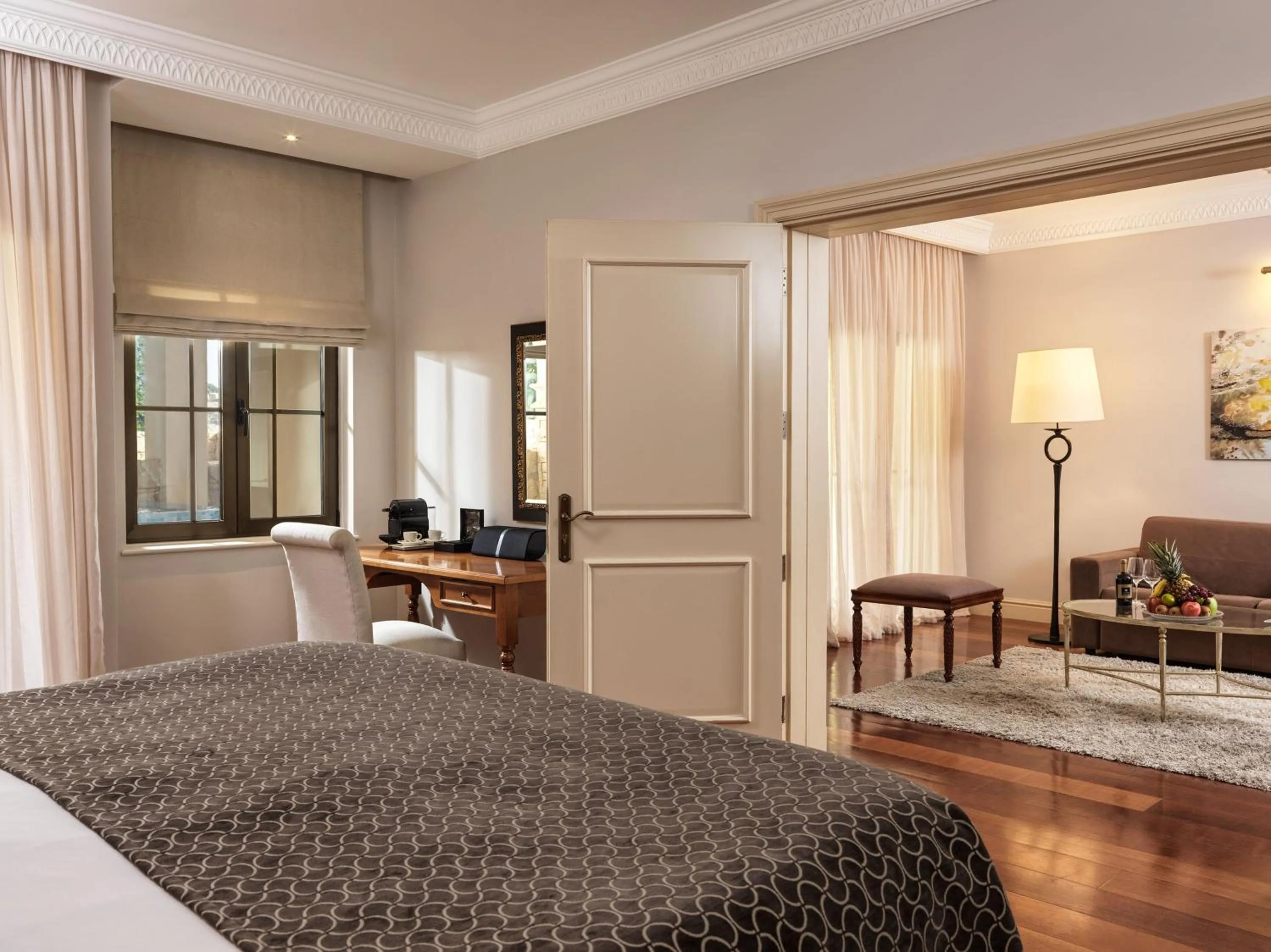 Seating area, Bed in Aphrodite Hills Hotel