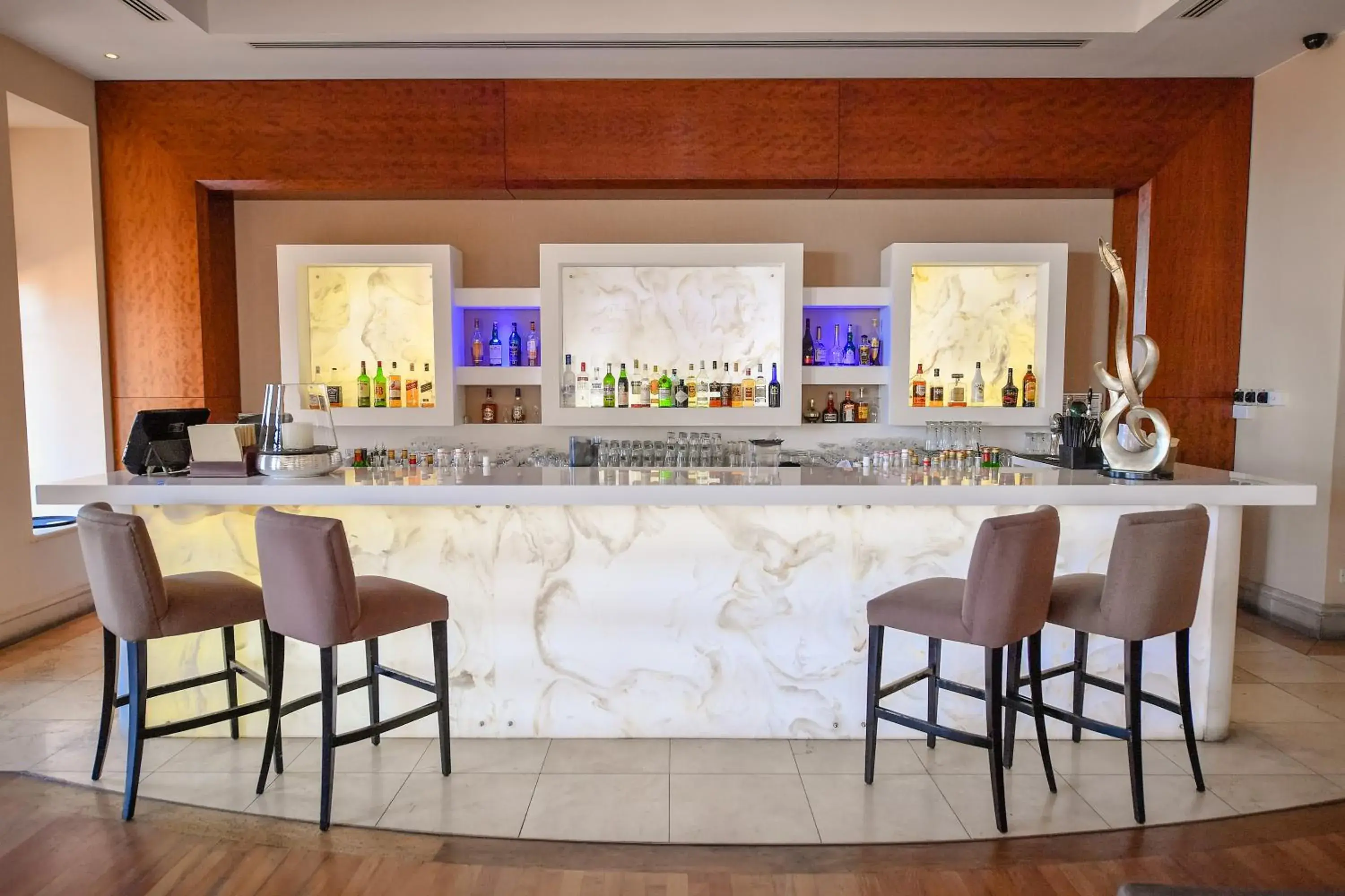 Lounge or bar in Aphrodite Hills Hotel Lounge or bar in Aphrodite Hills Hotel