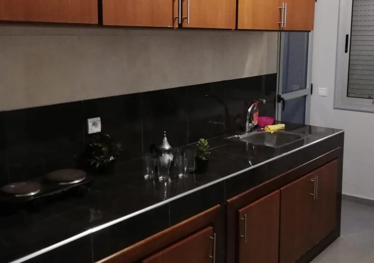 Kitchen or kitchenette in Appart Hotel Tanger Paname