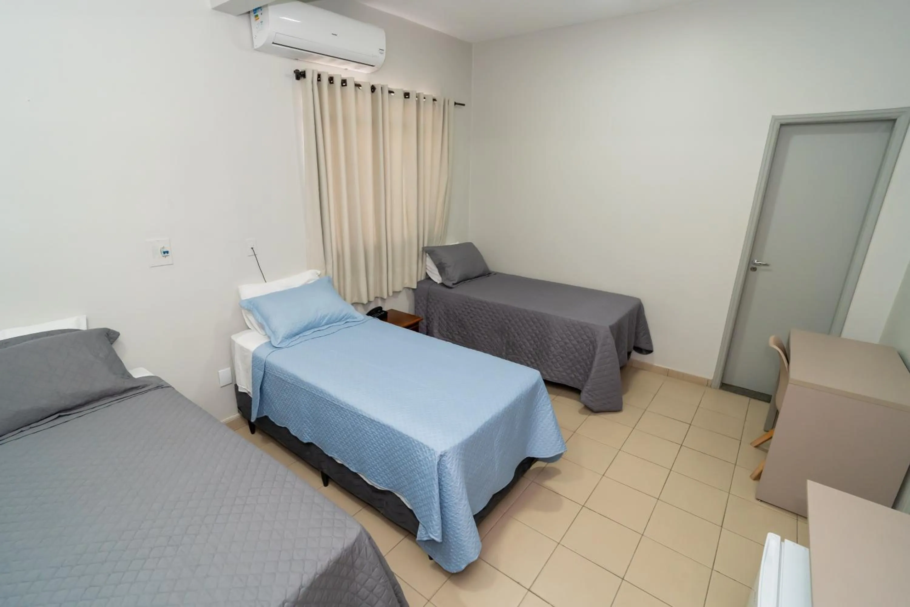 Bed in Bandeirantes Hotel