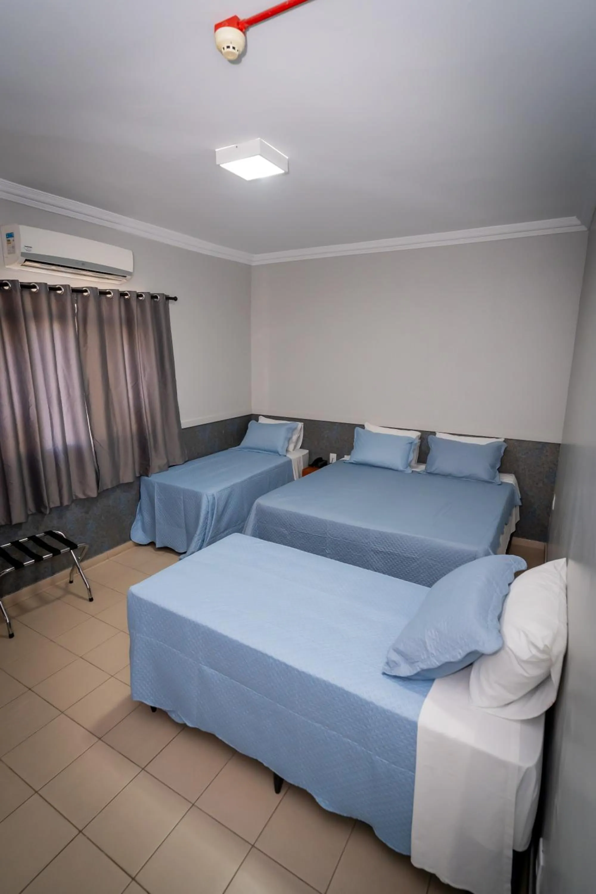 Bed in Bandeirantes Hotel