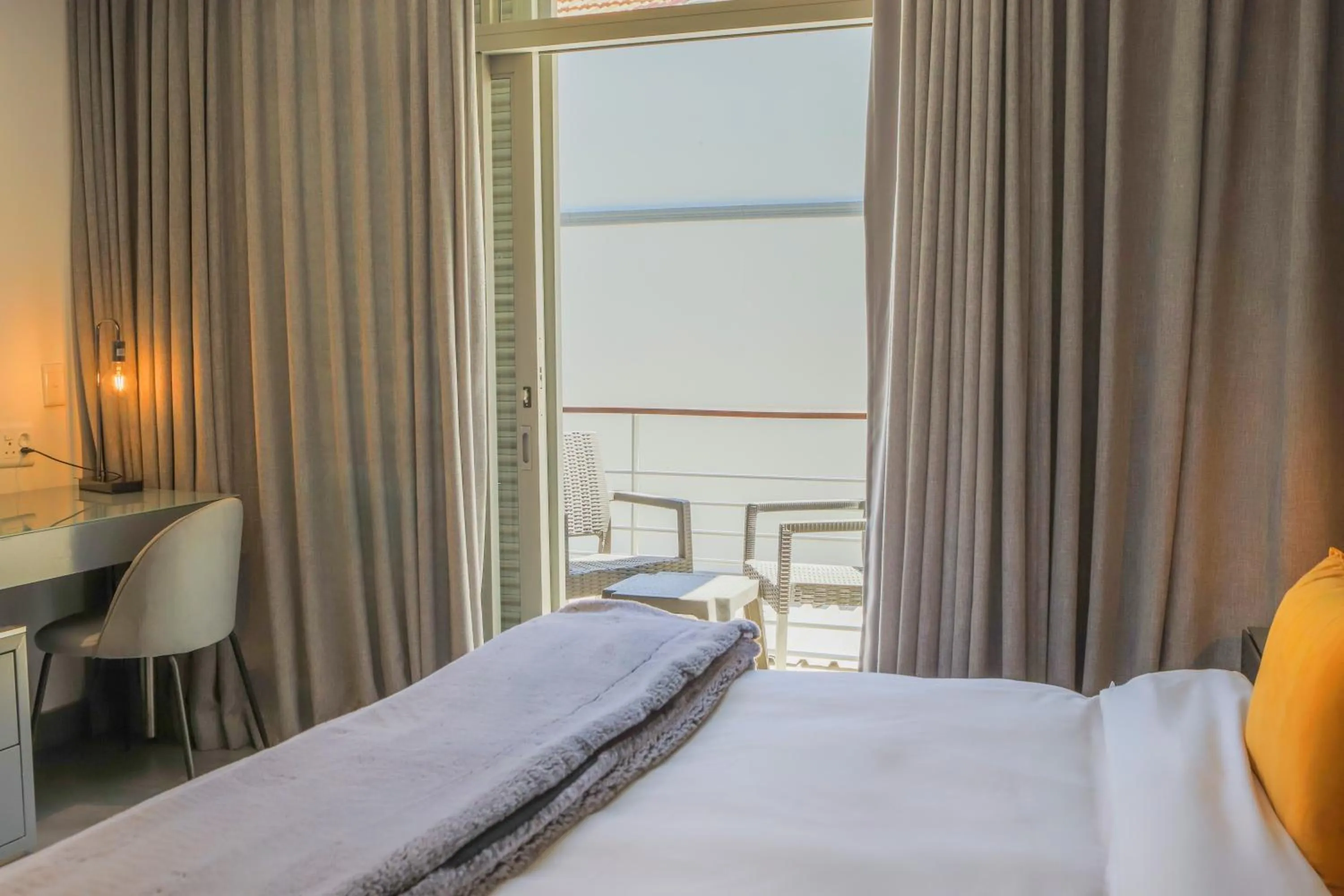 Bed in Atlantic Affair Boutique Hotel