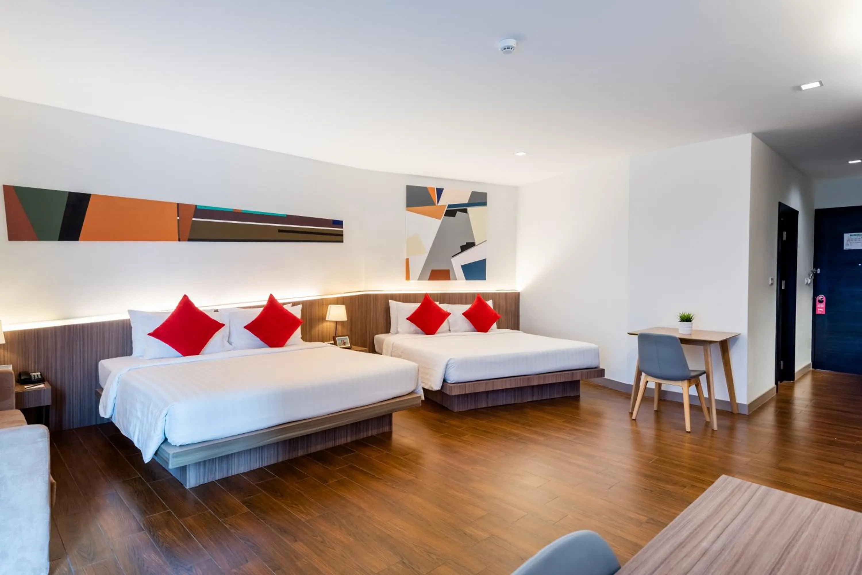 Bed in J Inspired Hotel Pattaya