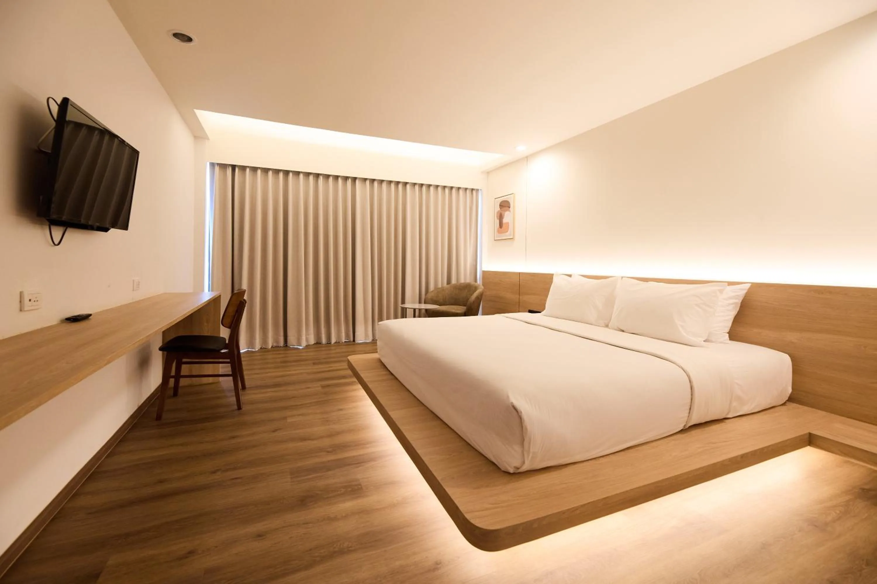 Bed in Welcome Plaza Hotel Pattaya