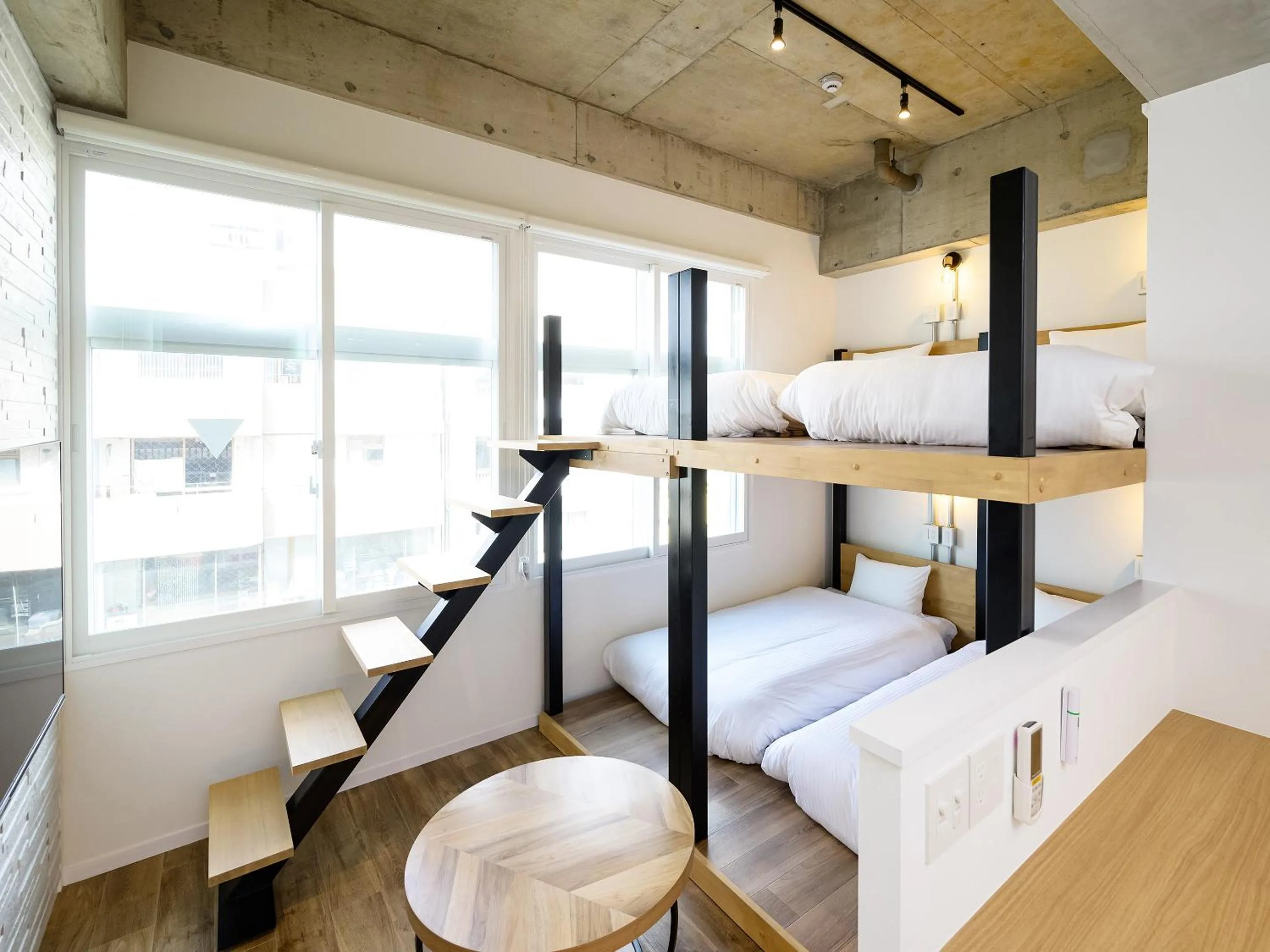 Photo of the whole room, Bed in HOTEL THE CUBE Naha Kokusai Street